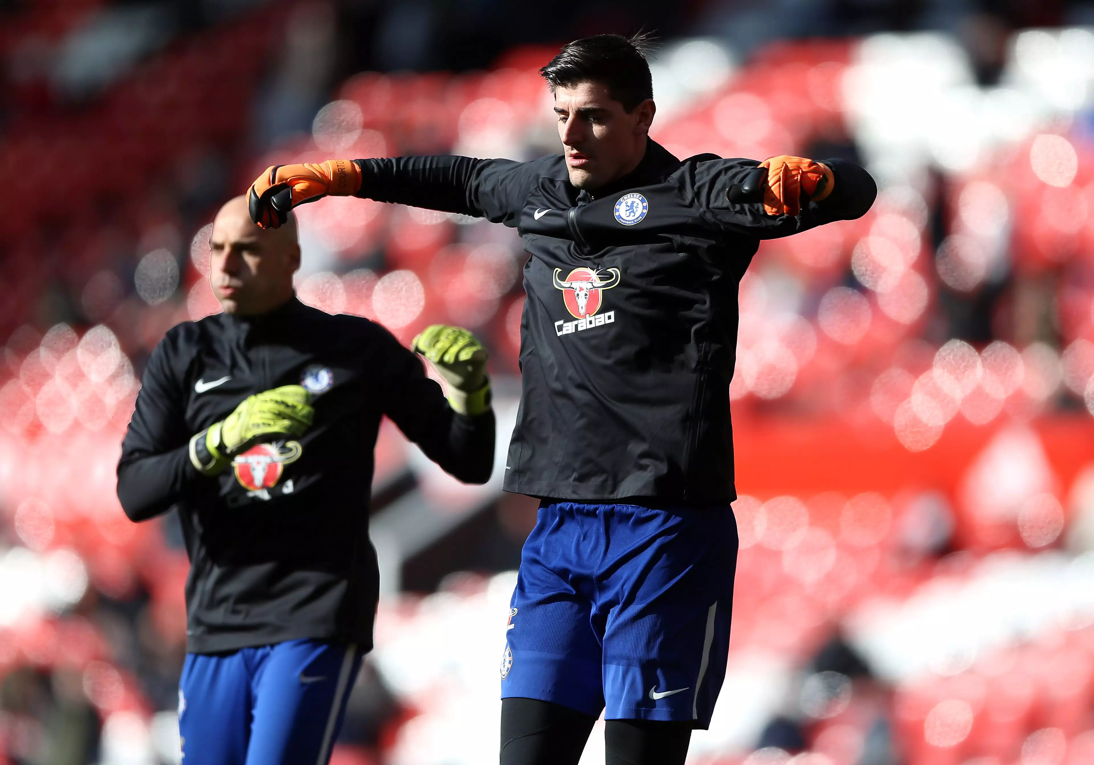 Courtois during the warm-up. Image: PA