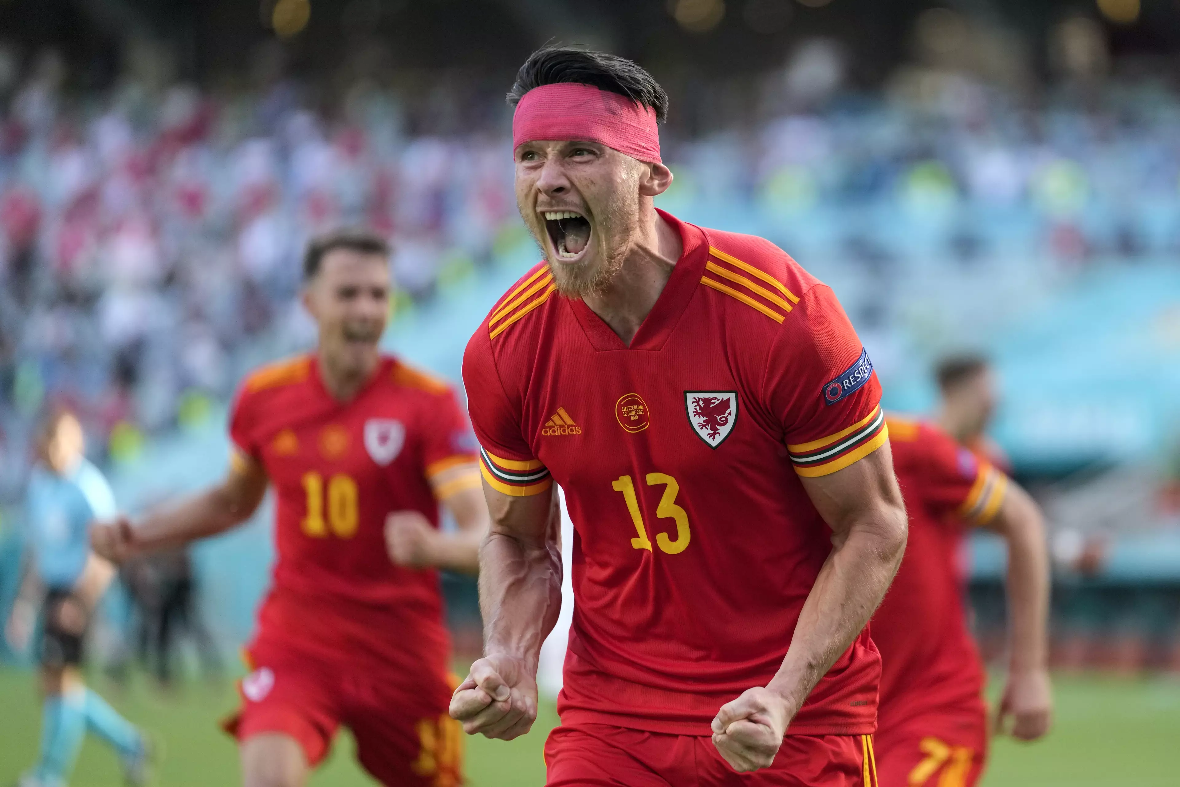 Wales' Kieffer Moore celebrates after scoring his side's opening goal during the Euro 2020 match between Wales and Switzerland.