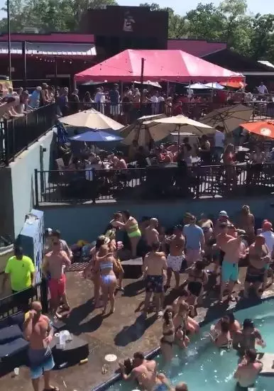 Hundreds packed into a pool party in the Ozarks for Memorial Day.