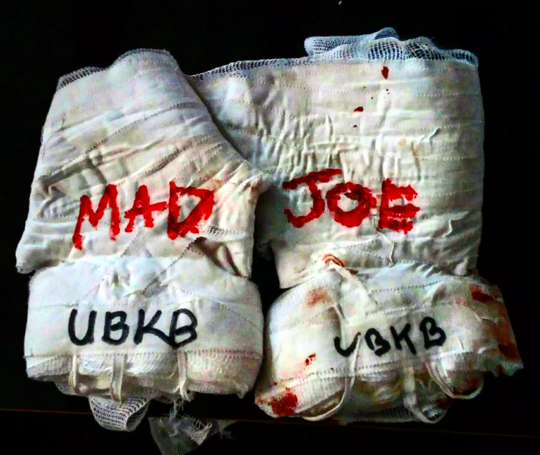 'Mad' Joe Clarke's gloves post bout.