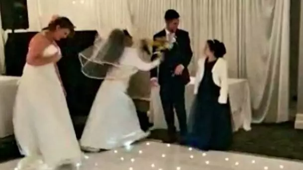 Bridesmaid Surprises Bride With 'Crazy Ex-Girlfriend' Prank At Her Wedding Reception