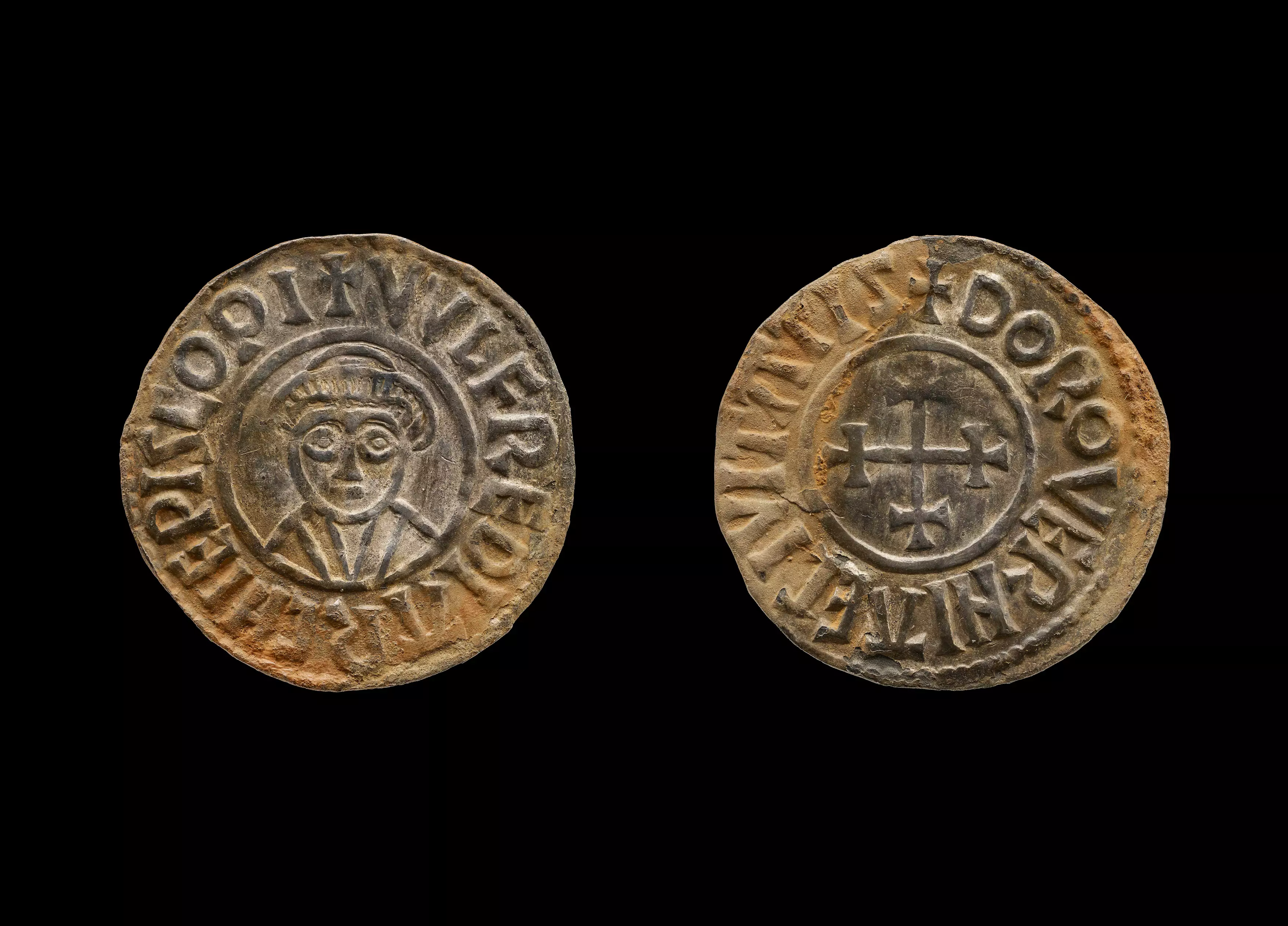 Two of the coins recovered.