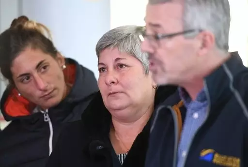 Emiliano Sala's sister Romina (left) and mother Mercedes (centre) listen to Blue Water Recoveries director David Mearns talk about plans to find and recover the plane.