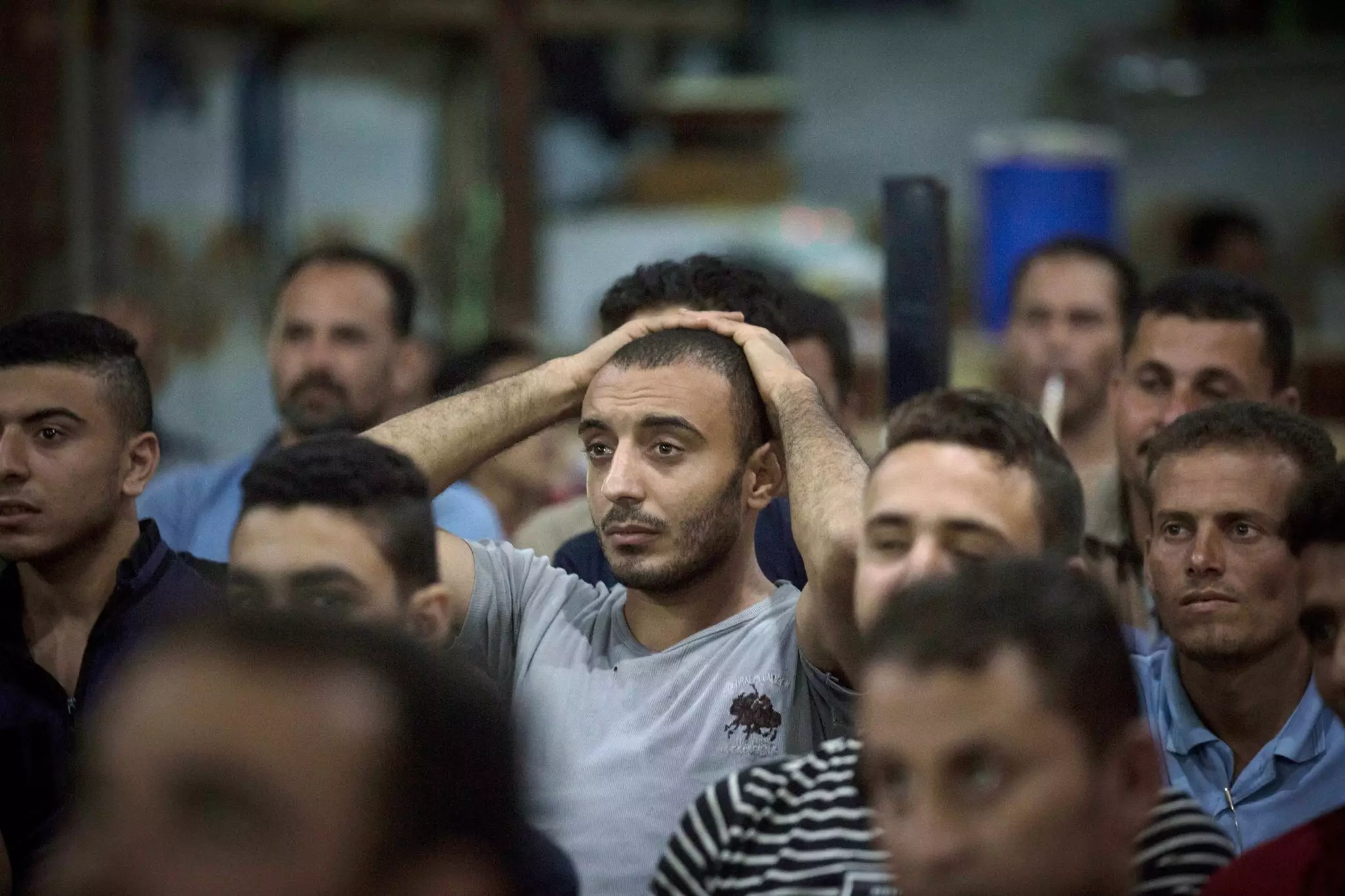 An Egyptian person reacts to Salah's injury. Image: PA
