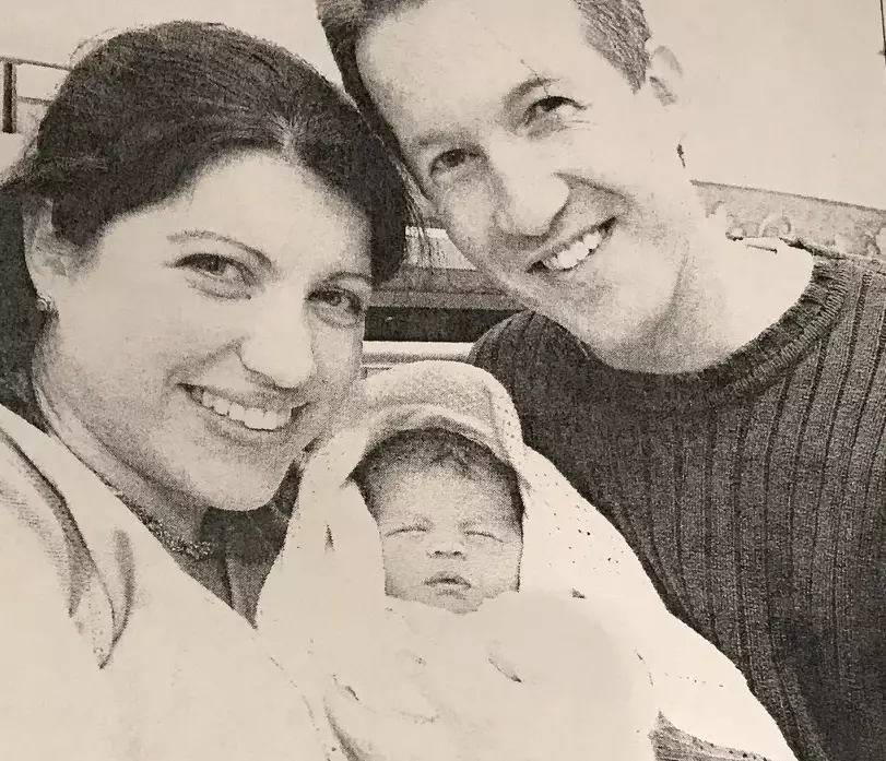 Isobel as a baby with her mum and dad.