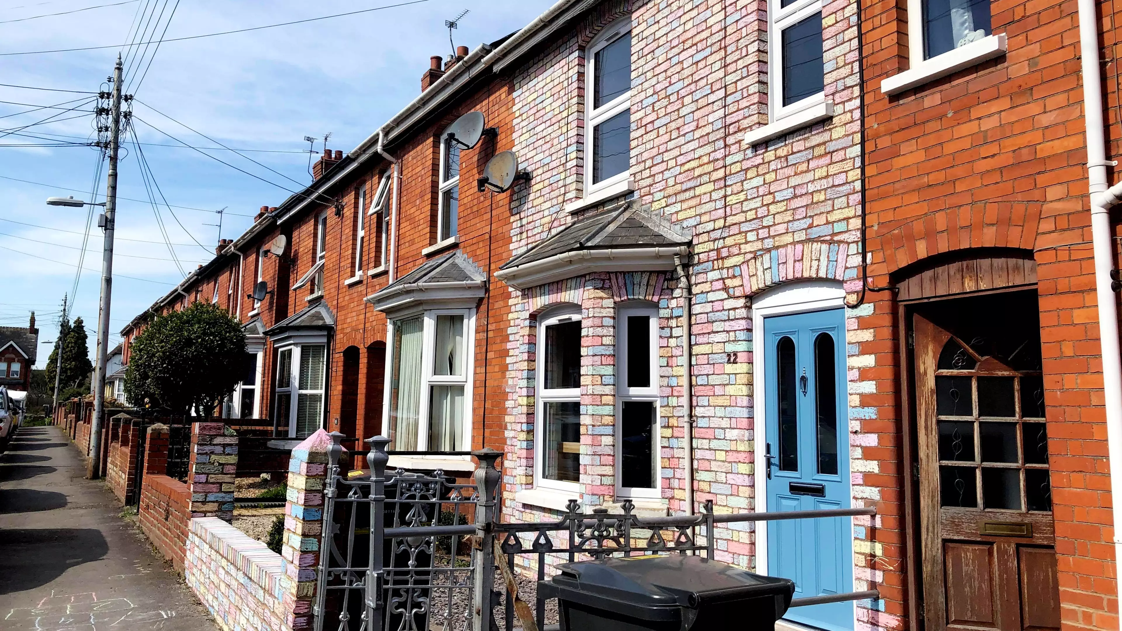 Family Colour Every Brick Of Their House With Chalk To Create A 'Rainbow' Home To Cheer Up Their Neighbours