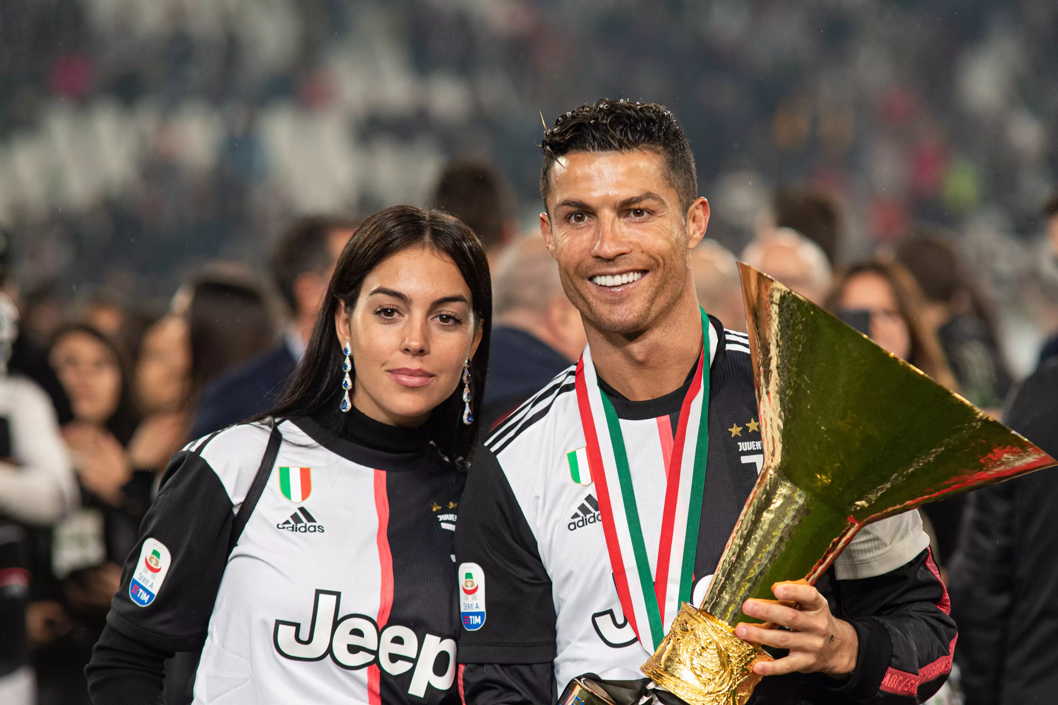 Cristiano Ronaldo and Georgina Rodriguez celebrate the championship victory during the Serie A football match Juventus vs Atalanta in 2019 (