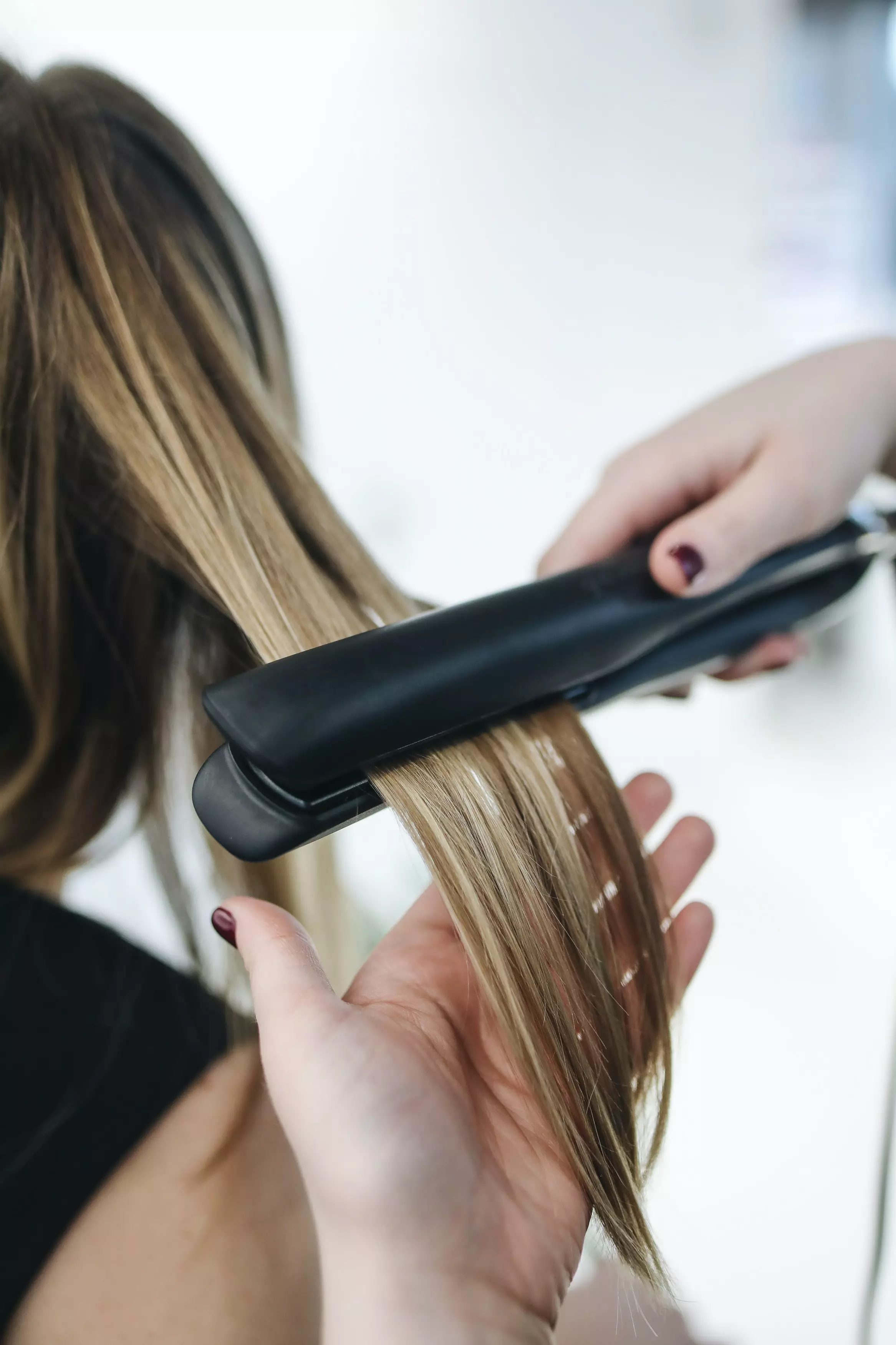 You can achieve curls with a hair straightener, and you don't have to be a pro... (