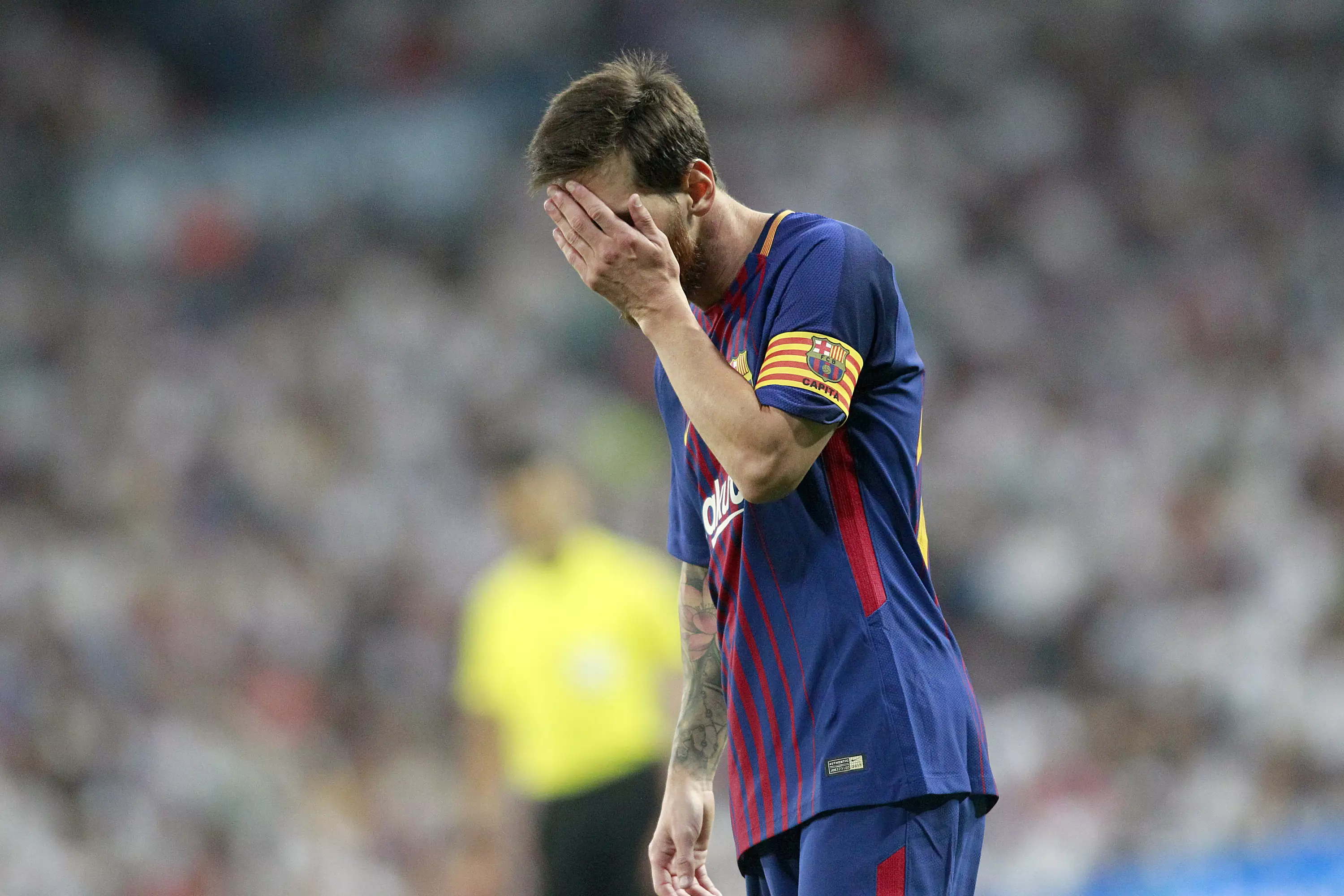 Messi cuts a dejected figure. Image: PA