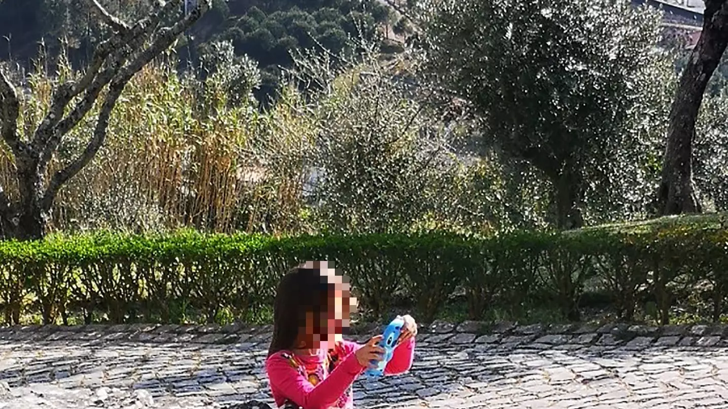 Optical Illusion Showing Girl Sunk Into Pavement Baffles The Internet
