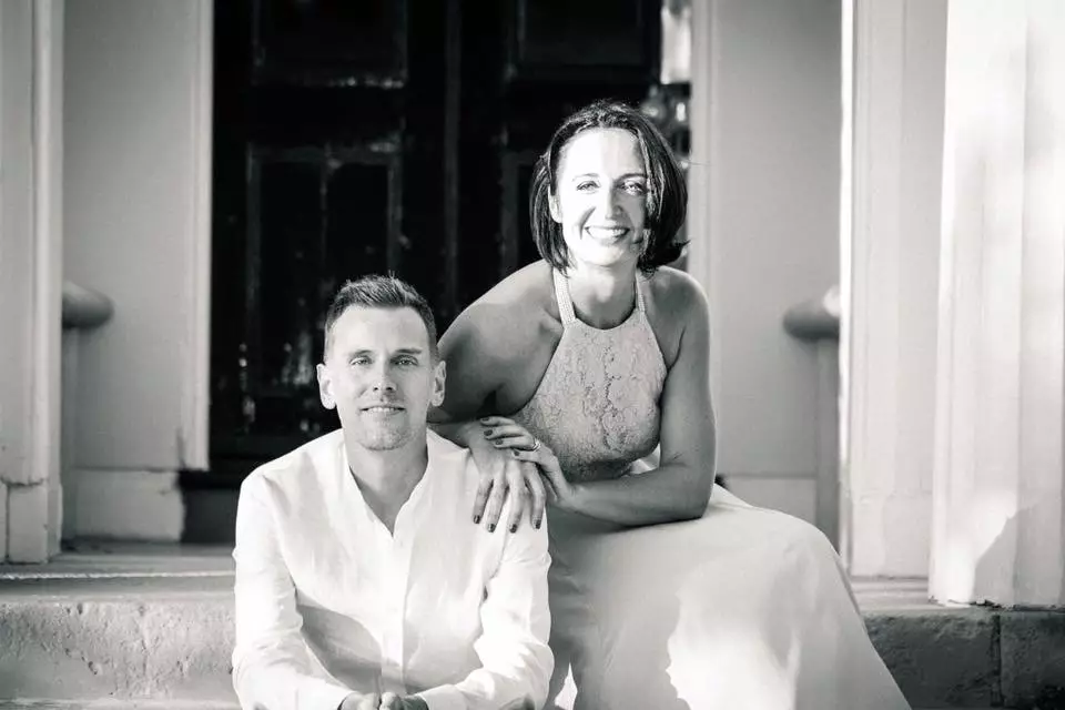 Nikki pictured with her husband on her wedding day.