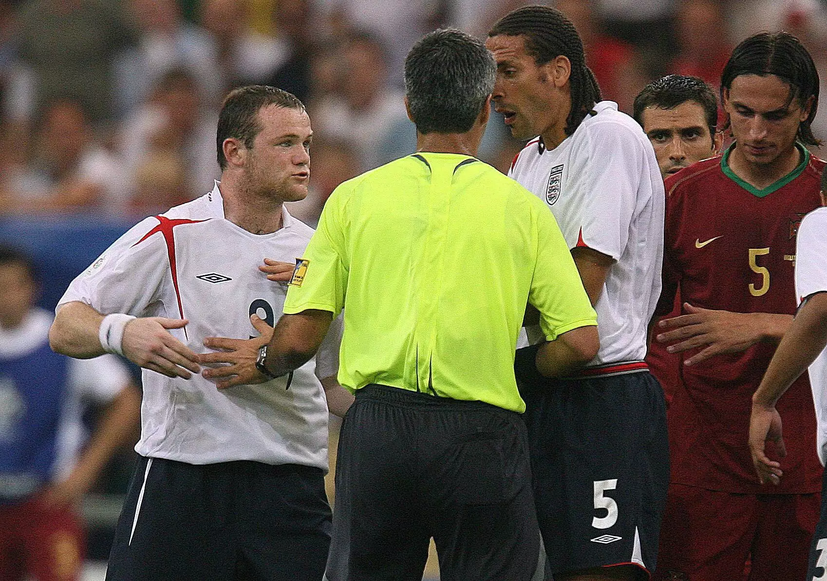 Rooney argues with the referee. Image: PA Images