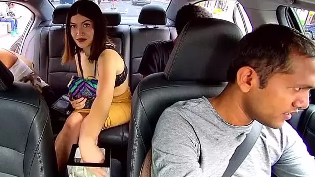 Footage Shows Woman Brazenly Stealing Uber Taxi Driver's Tips