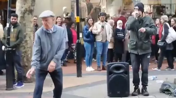 Dancing Pensioner Performs Beatboxing Dance As Crowd Gathers