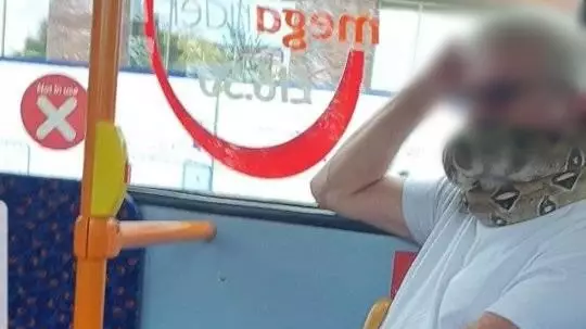 Man Spotted On Greater Manchester Bus Wearing Snake As Face Mask