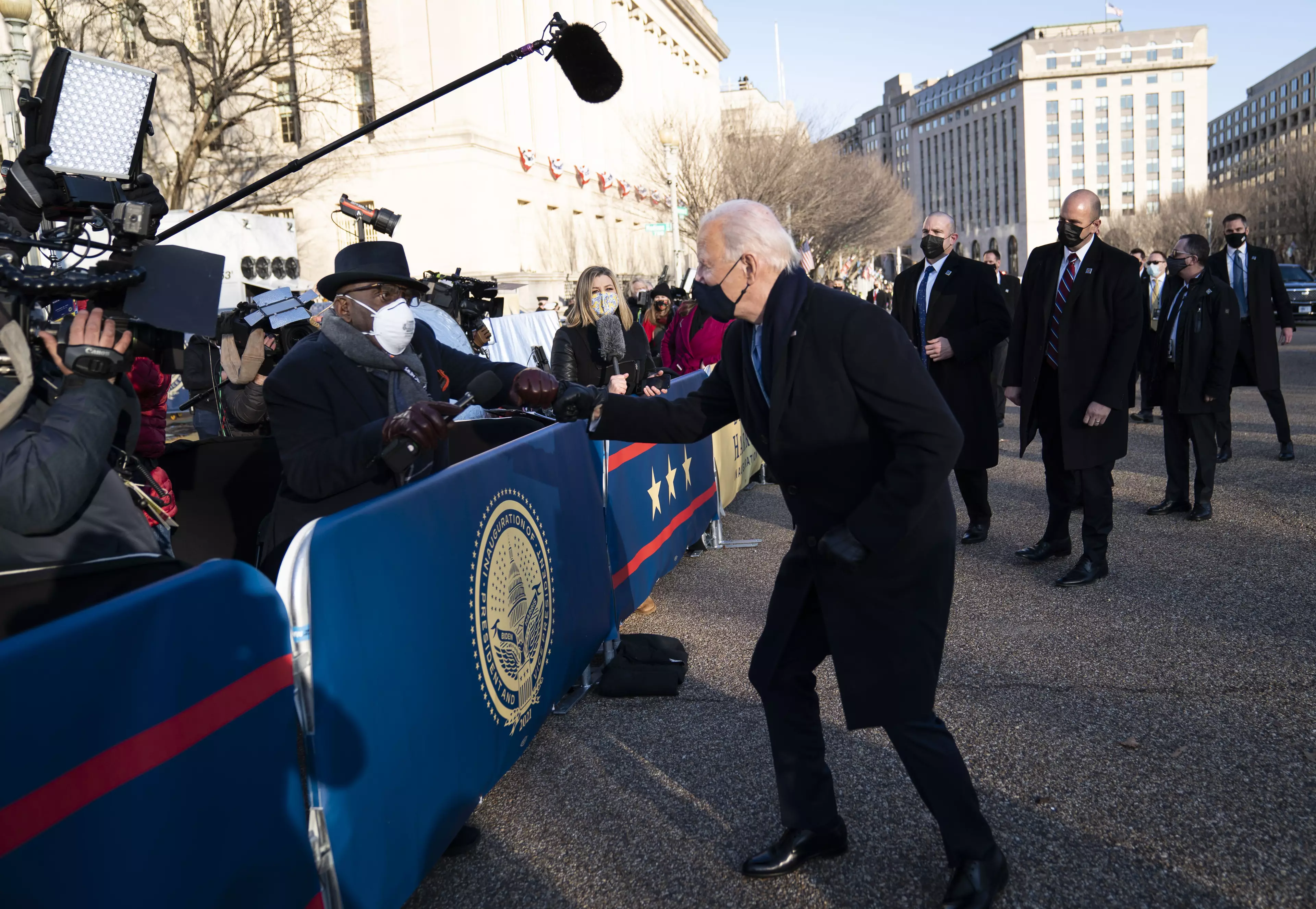 Joe Biden fist bumps journalist Al Roker.