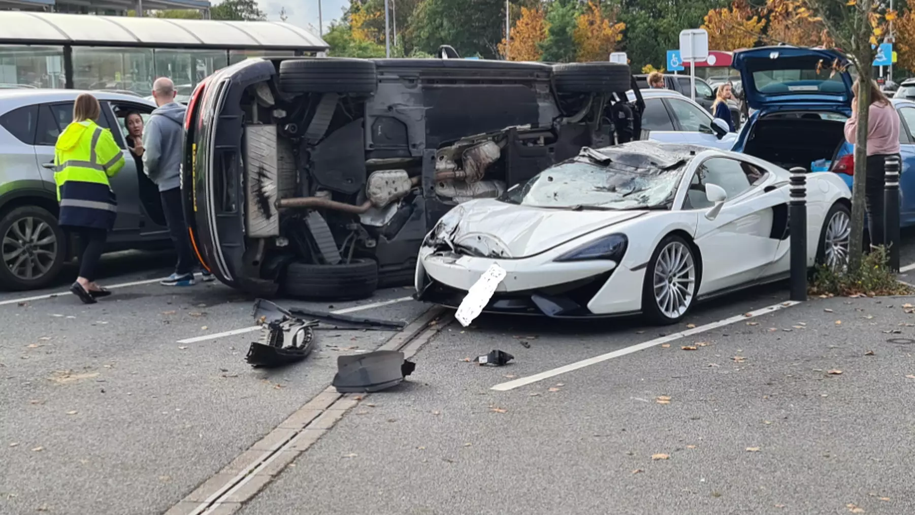McLaren Left Badly Damaged After Run-In With Audi In Supermarket Carpark 