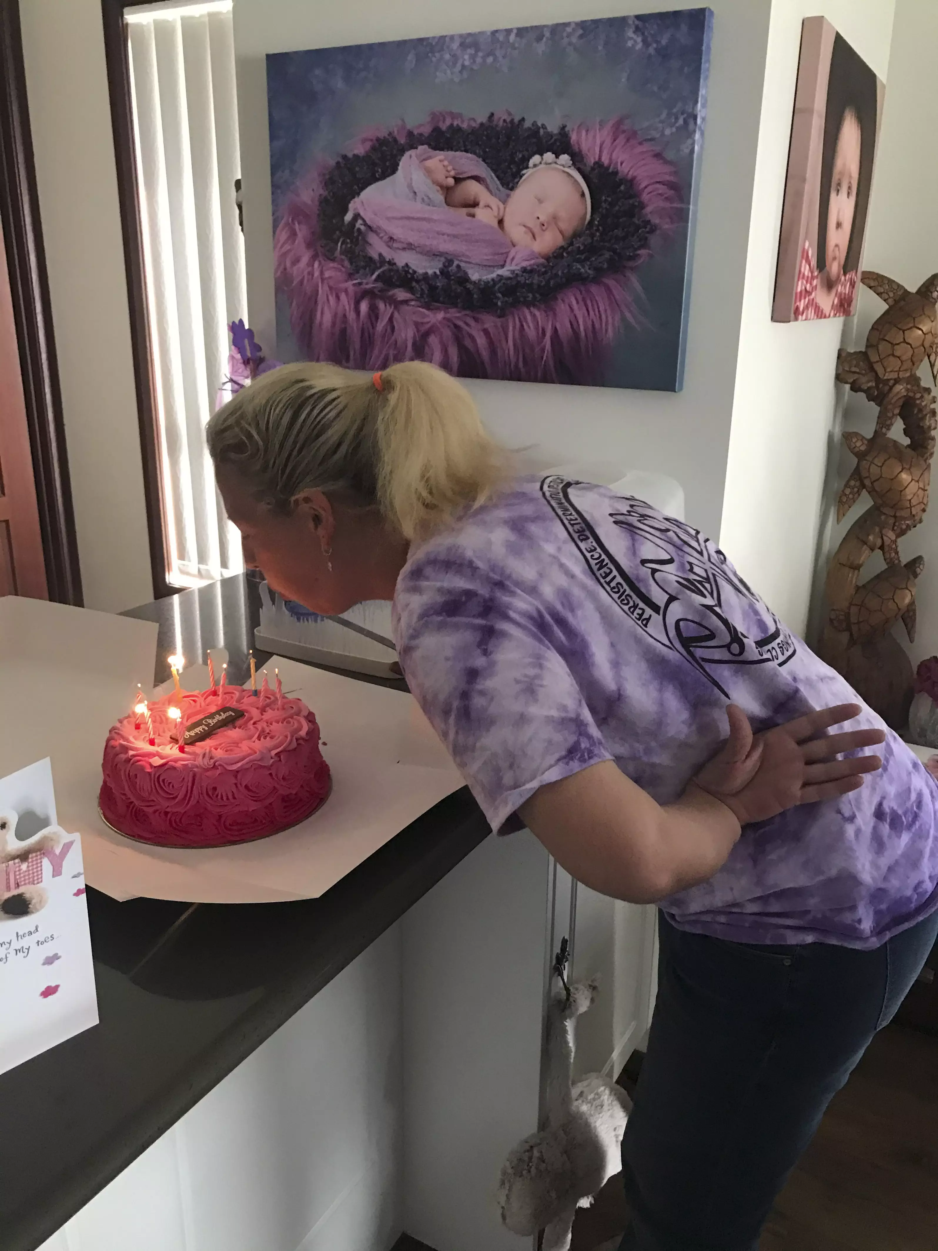 Jamie Hogan blowing out her candles.