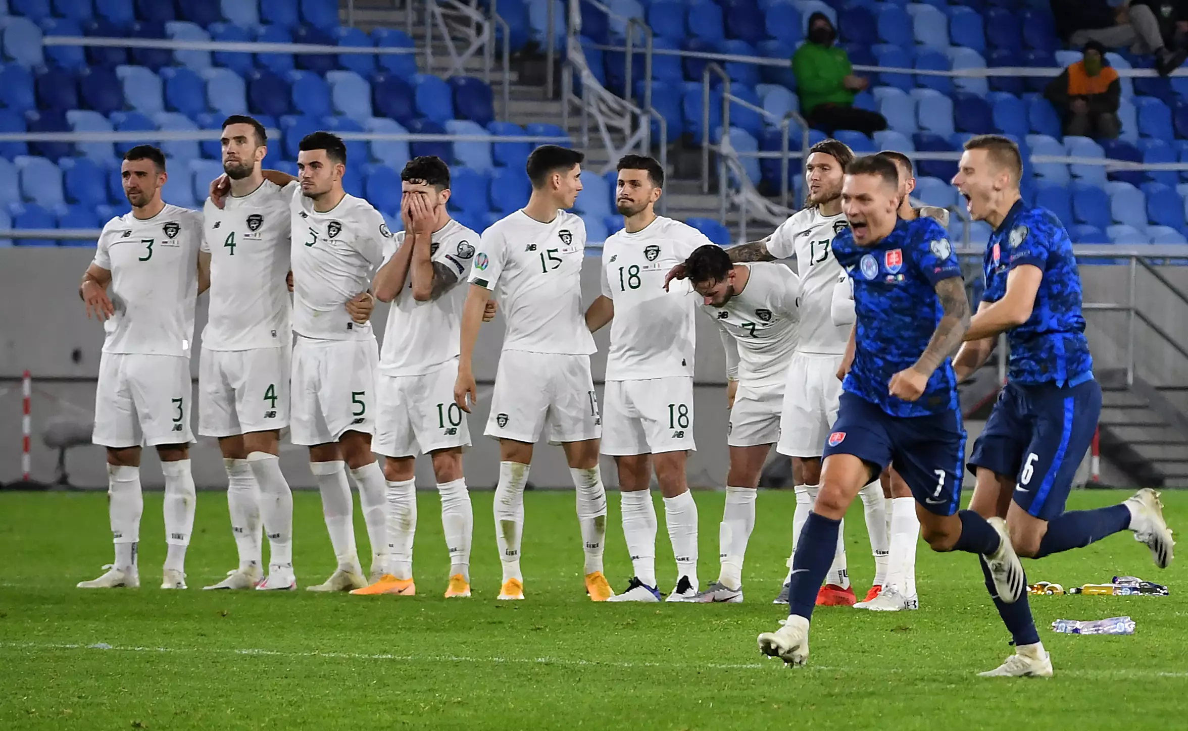 Slovakia players celebrate penalty win whilst Ireland players look distraught. Image: PA Images