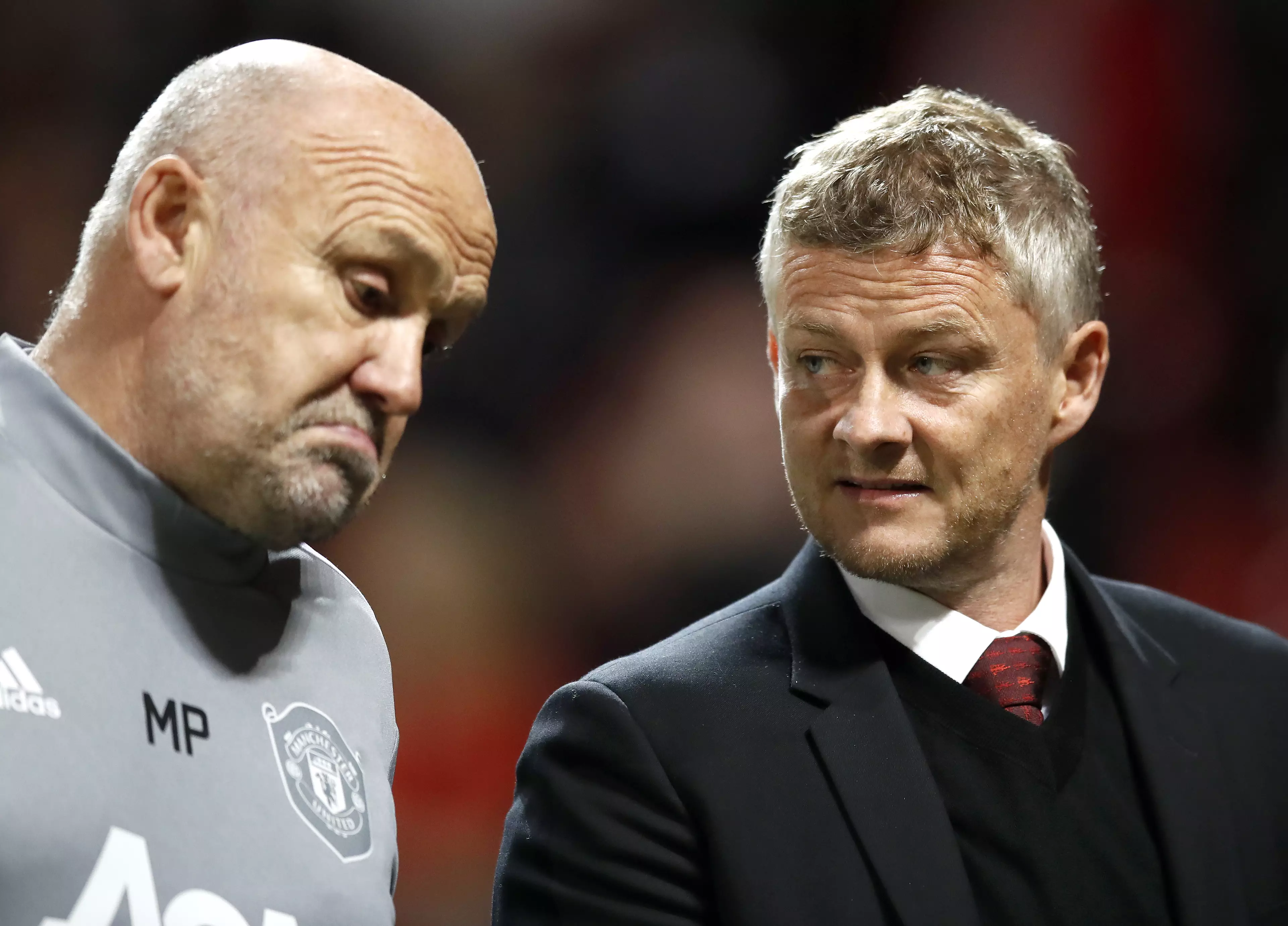 Phelan and Solskjaer trying to work what in the world to do on Sunday. Image: PA Images