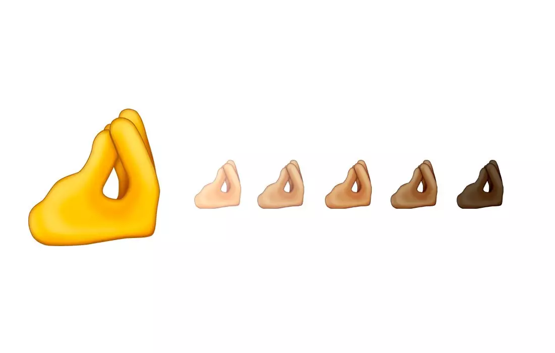 The new 'pinching fingers' emoji is going down well online (