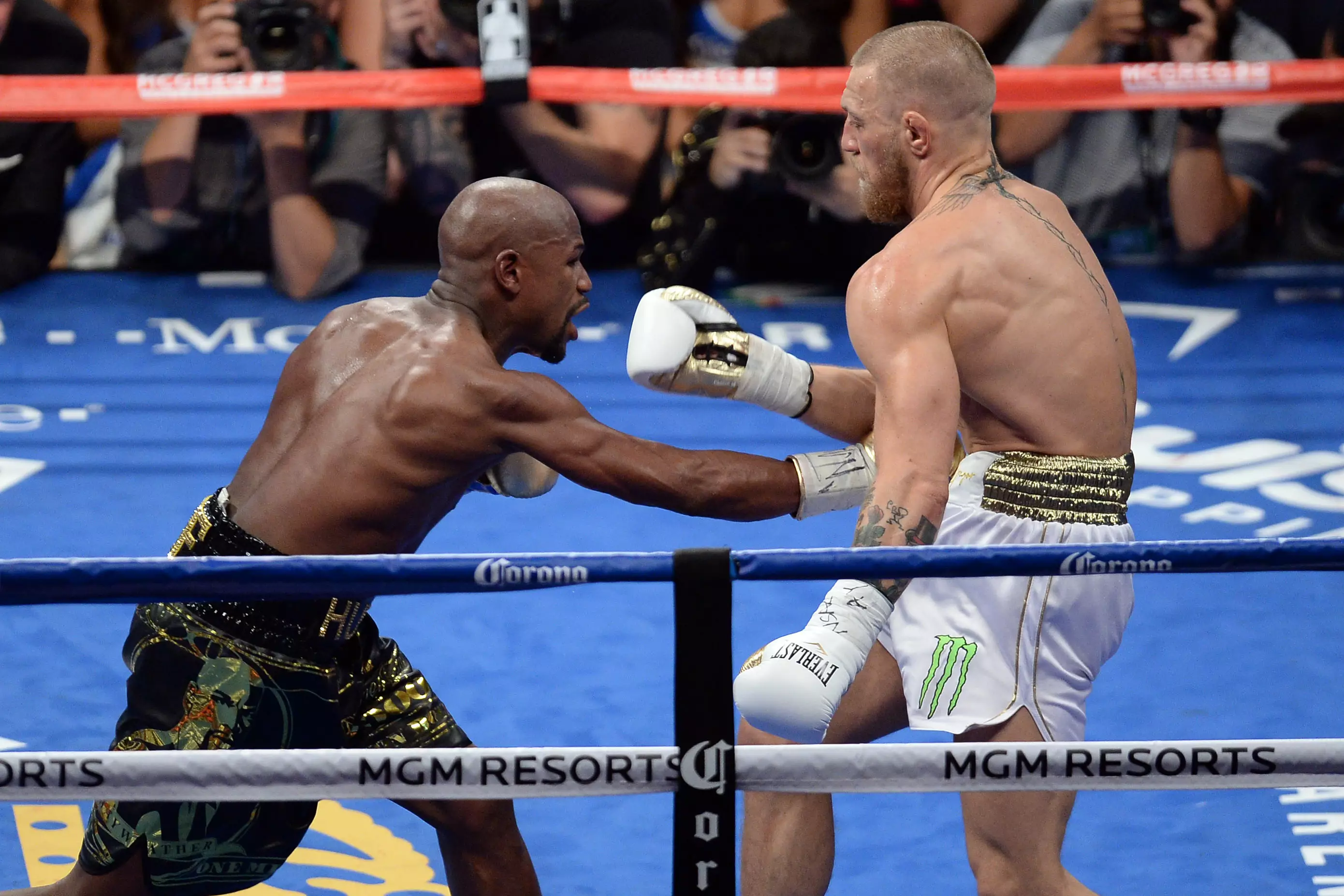 Mayweather against McGregor. Image: PA Images