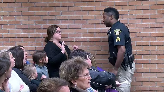 ​Teacher Handcuffed After Criticising Superintendent's Pay Rise At School Board Meeting