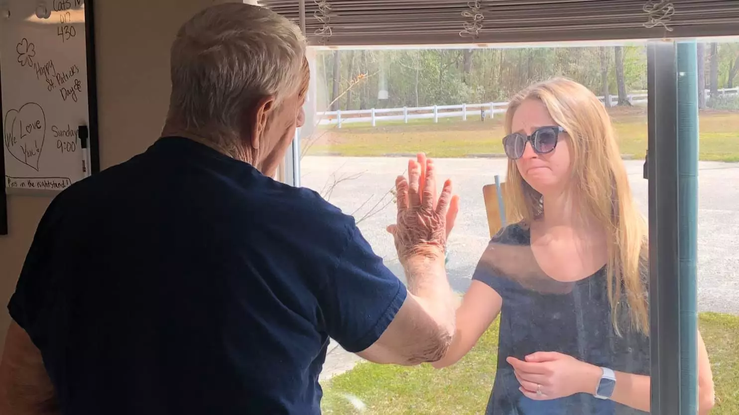 Touching Moment Woman Shows Grandad Engagement Ring Through Window Due To Coronavirus Isolation