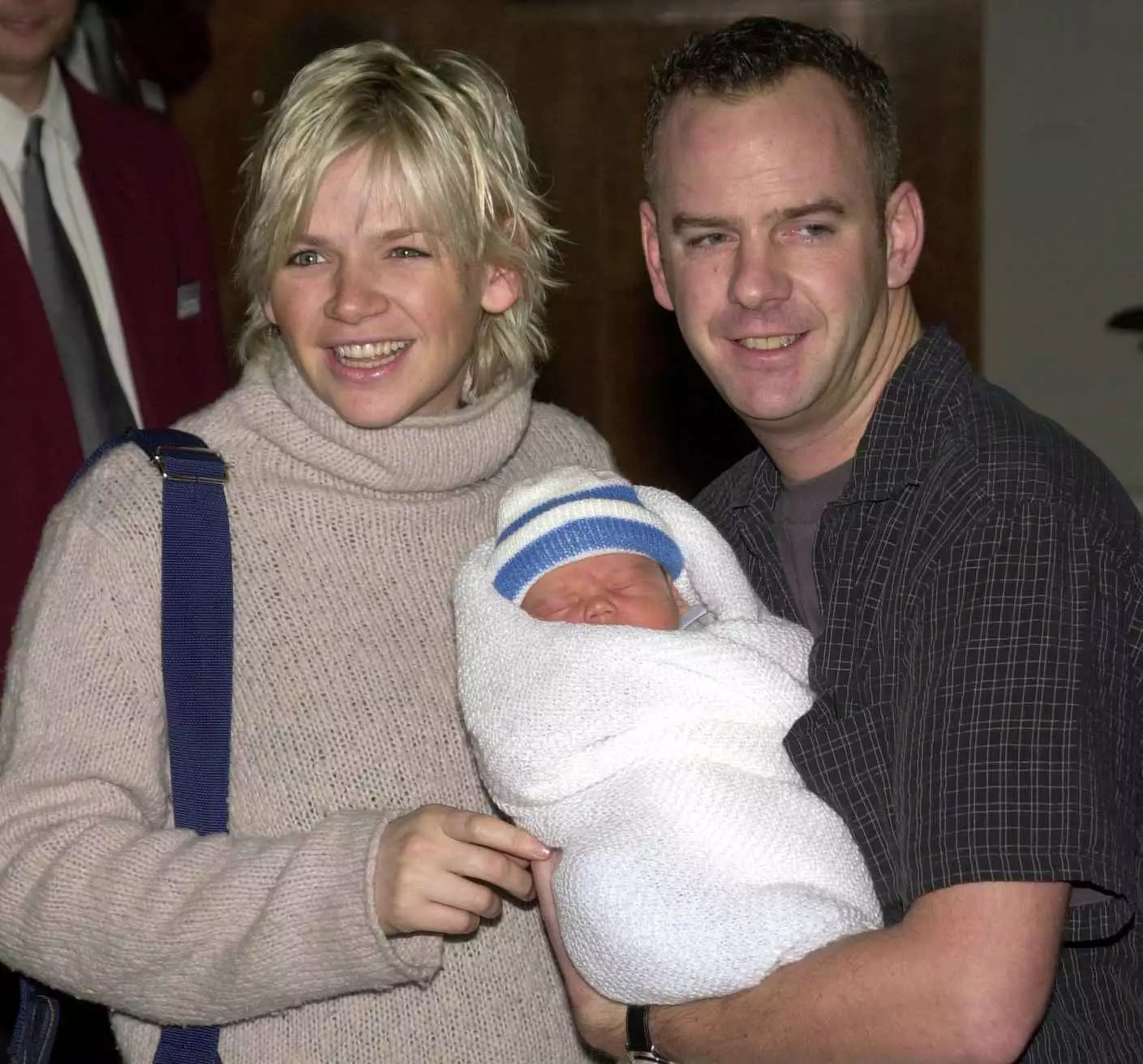 Zoe Ball and Norman Cook aka Fat Boy Slim leaving the hospital with Woody in 2000.