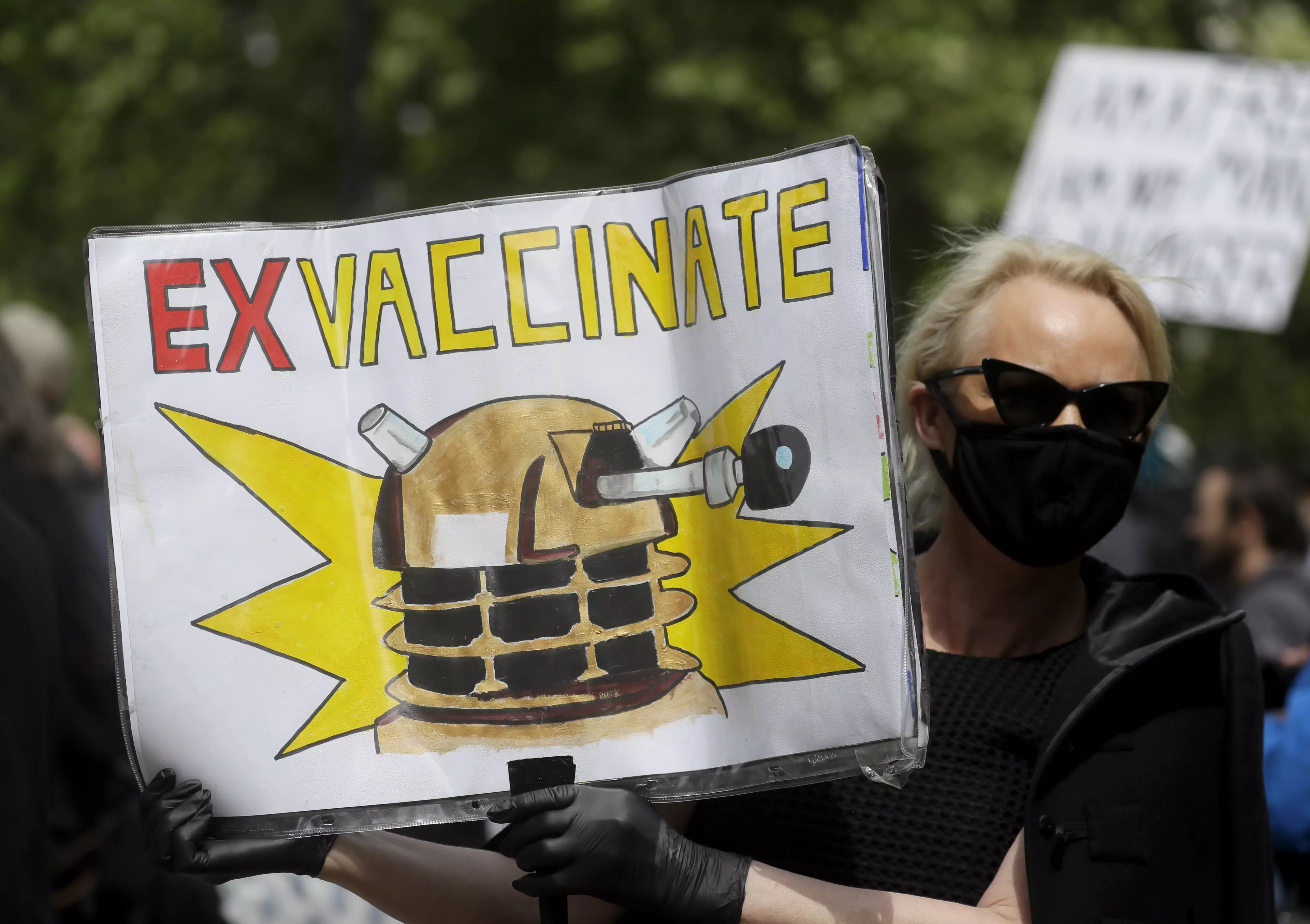 Some of the protesters carried anti-vaccination placards.