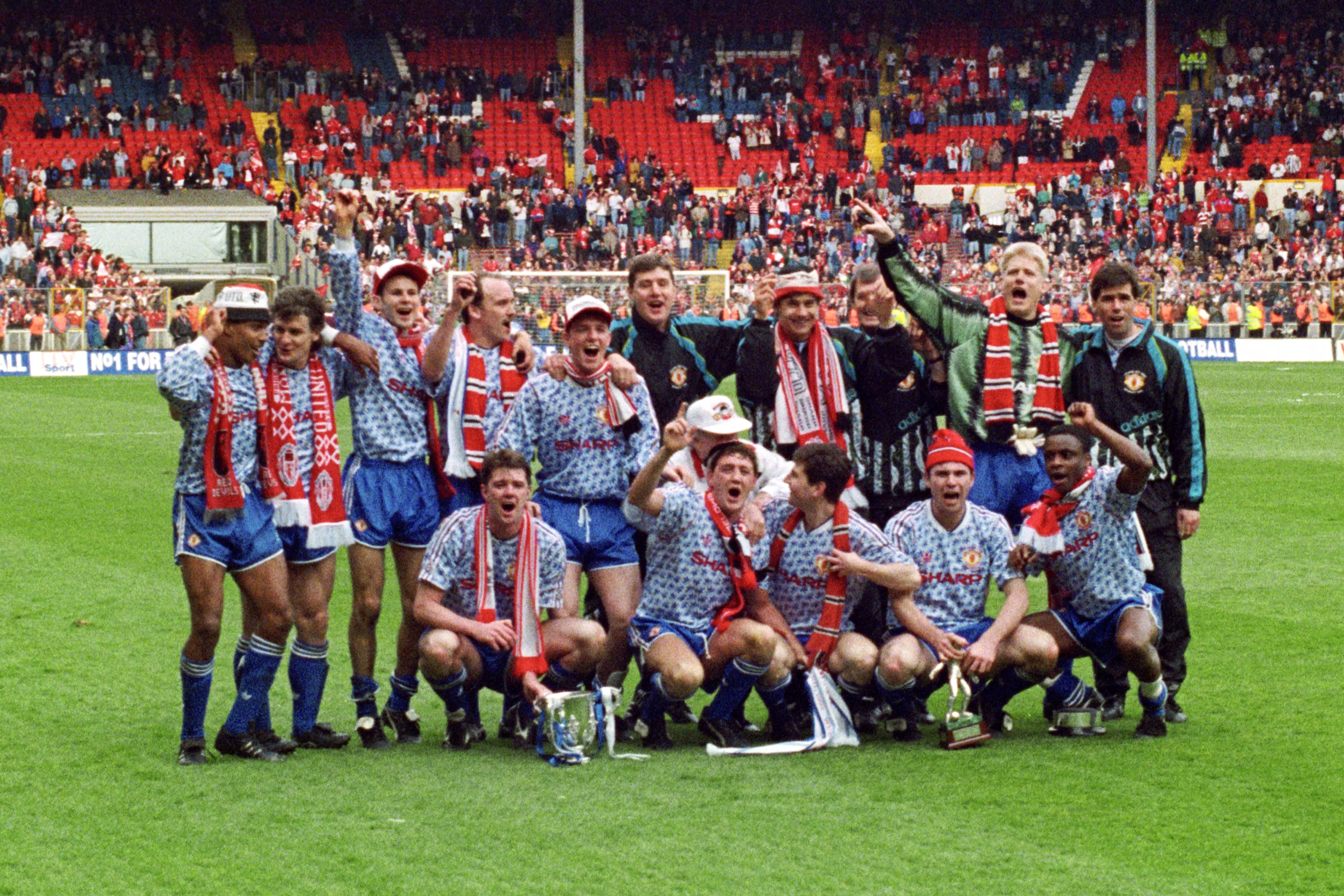 United celebrate the Rumbelows Cup in the original version of the kit. Image: PA Images