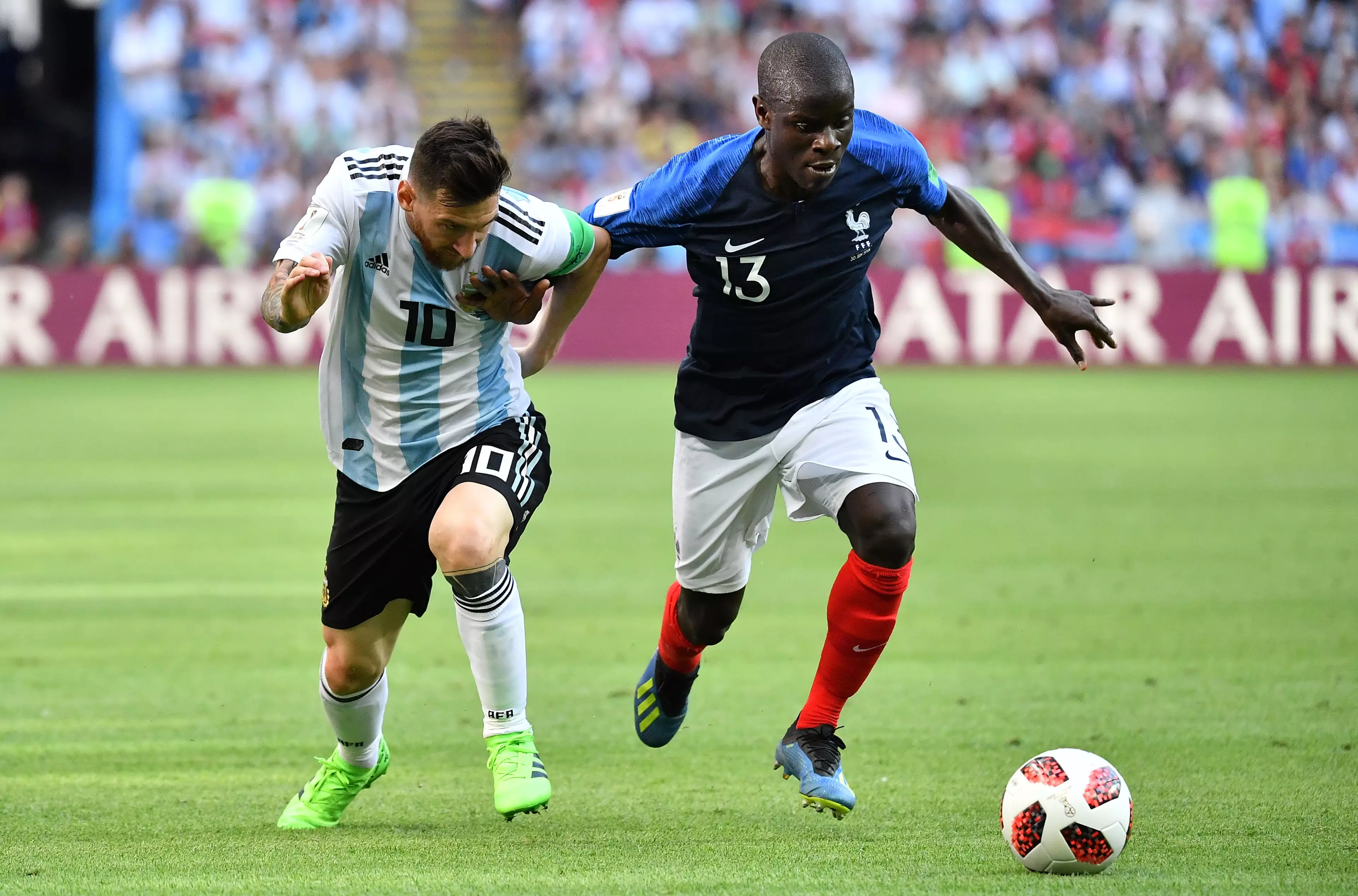 Messi and N'Golo Kante jostle for possesion at the World Cup last year (Photo