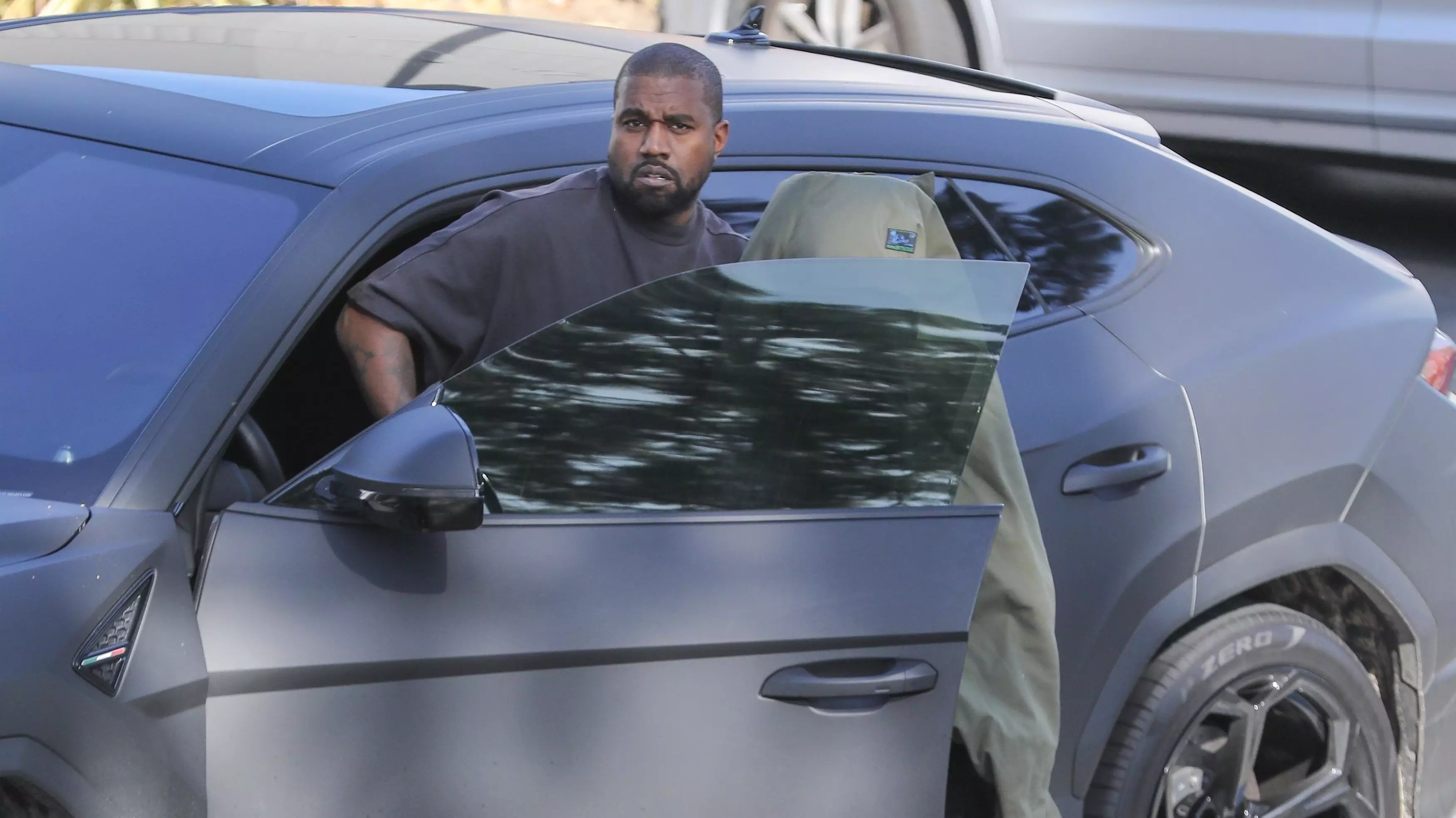 Photos Show Kanye West Helping Out Homeless Veteran On Side Of Road