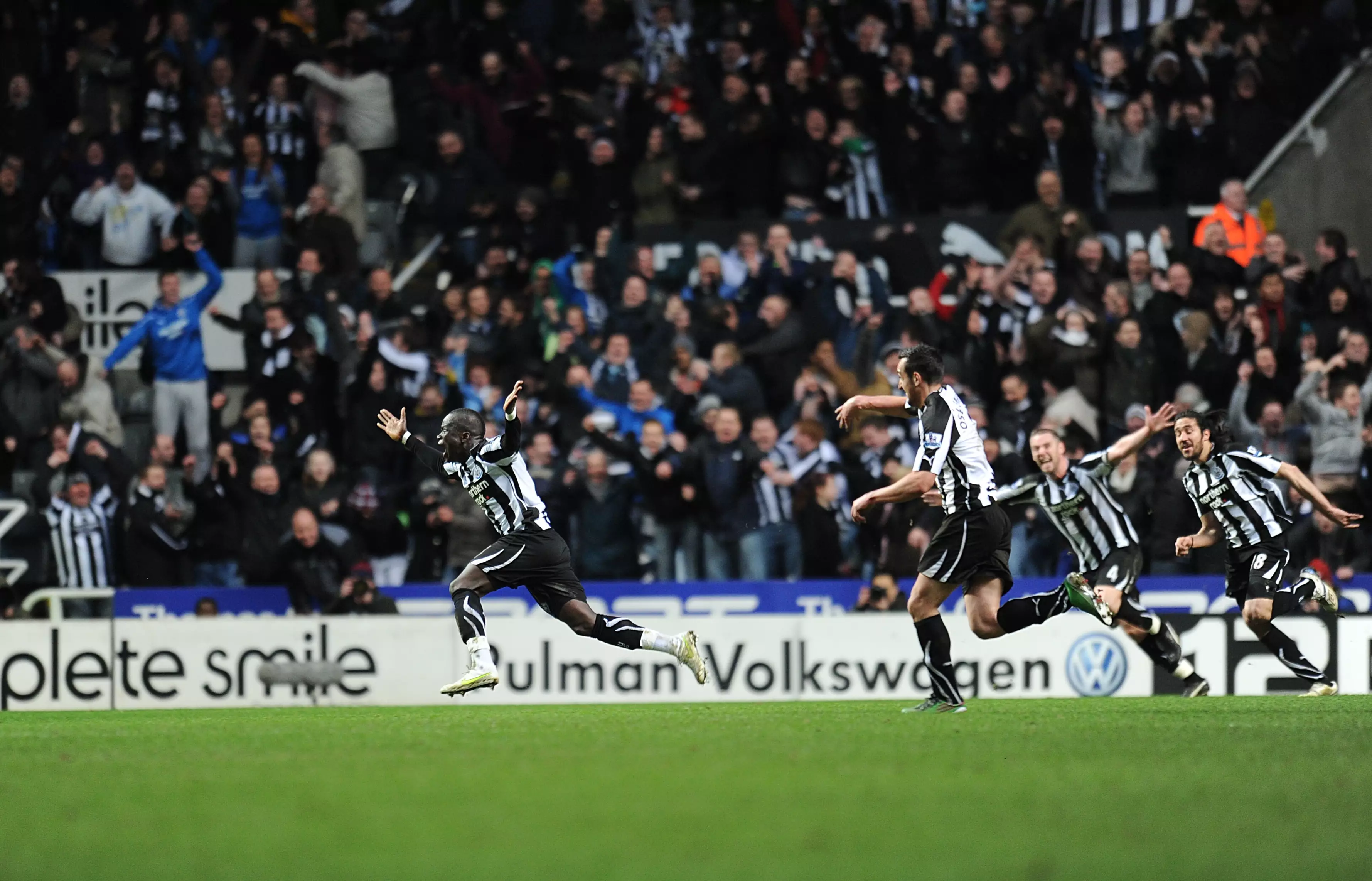 The Newcastle players chase their goalscorer in celebration. Image: PA Images