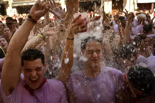 Revellers celebrate the official opening of the 2019 San Fermin fiestas in Pamplona.