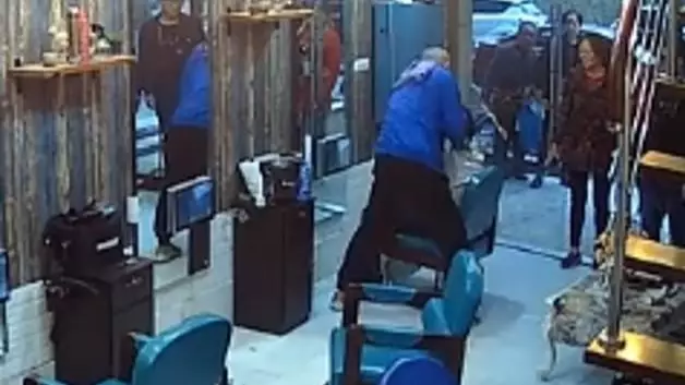 Furious Customer Pins Down Barber And Shaves His Head