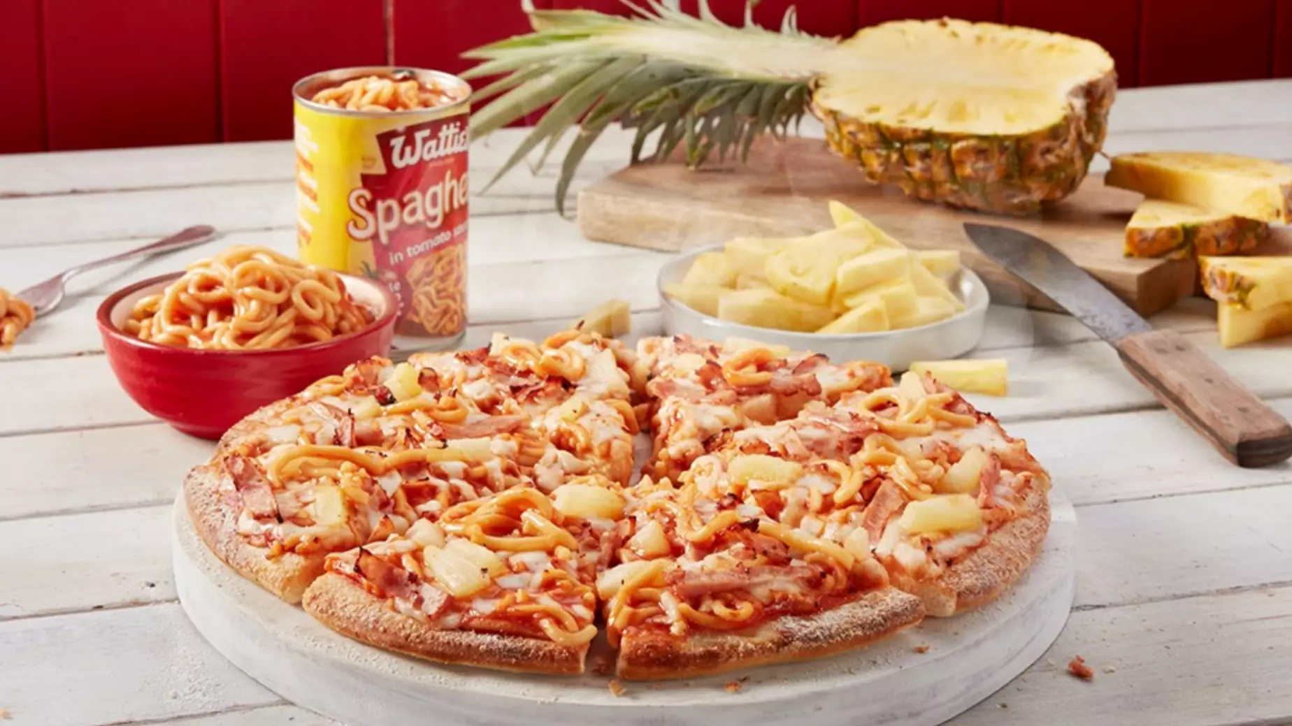  Domino's Launches Pineapple And Canned Spaghetti Pizza