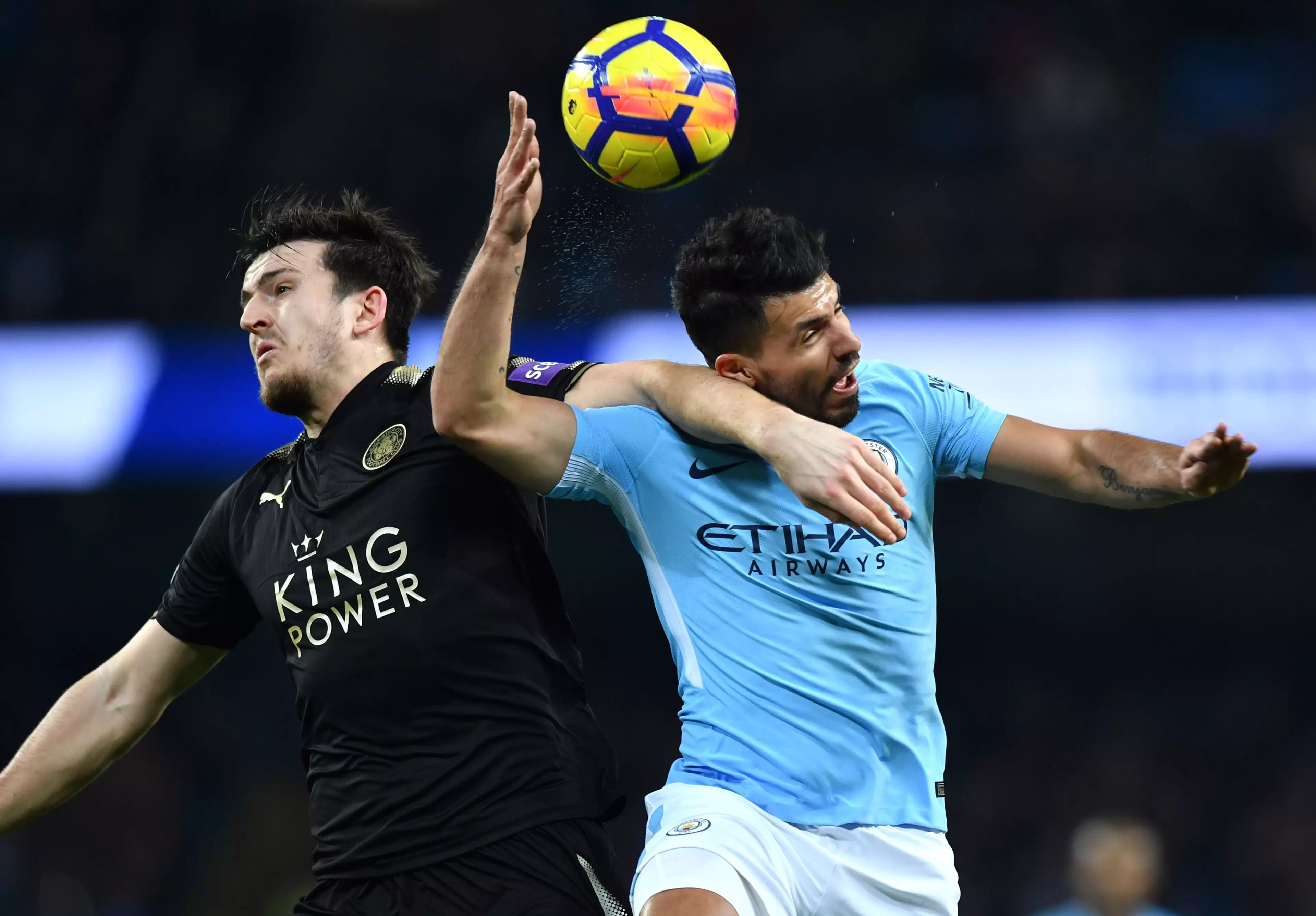Maguire and Aguero battle for an aerial ball. Image: PA