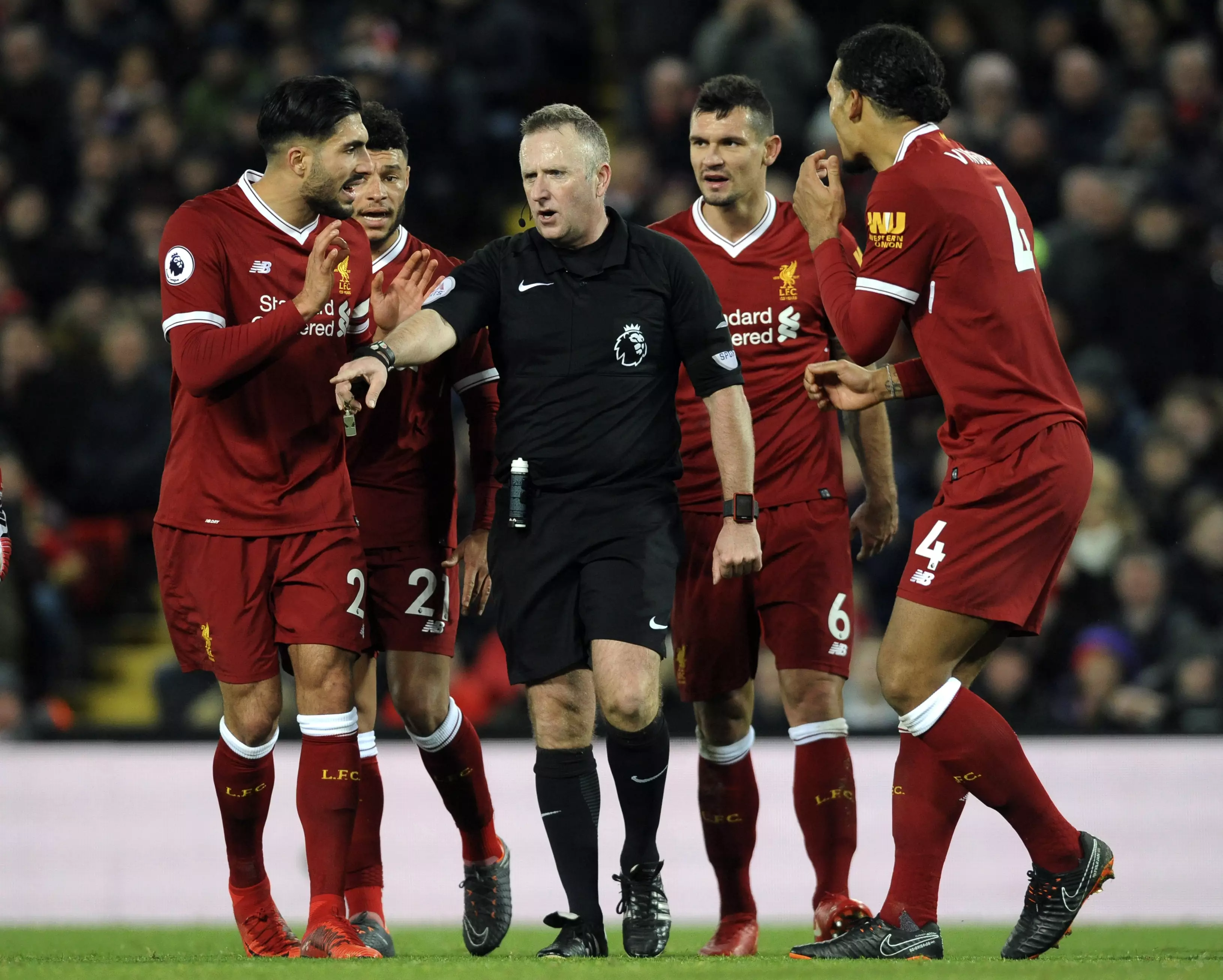 Liverpool players argue the awarding of the second penalty. Image: PA Images.