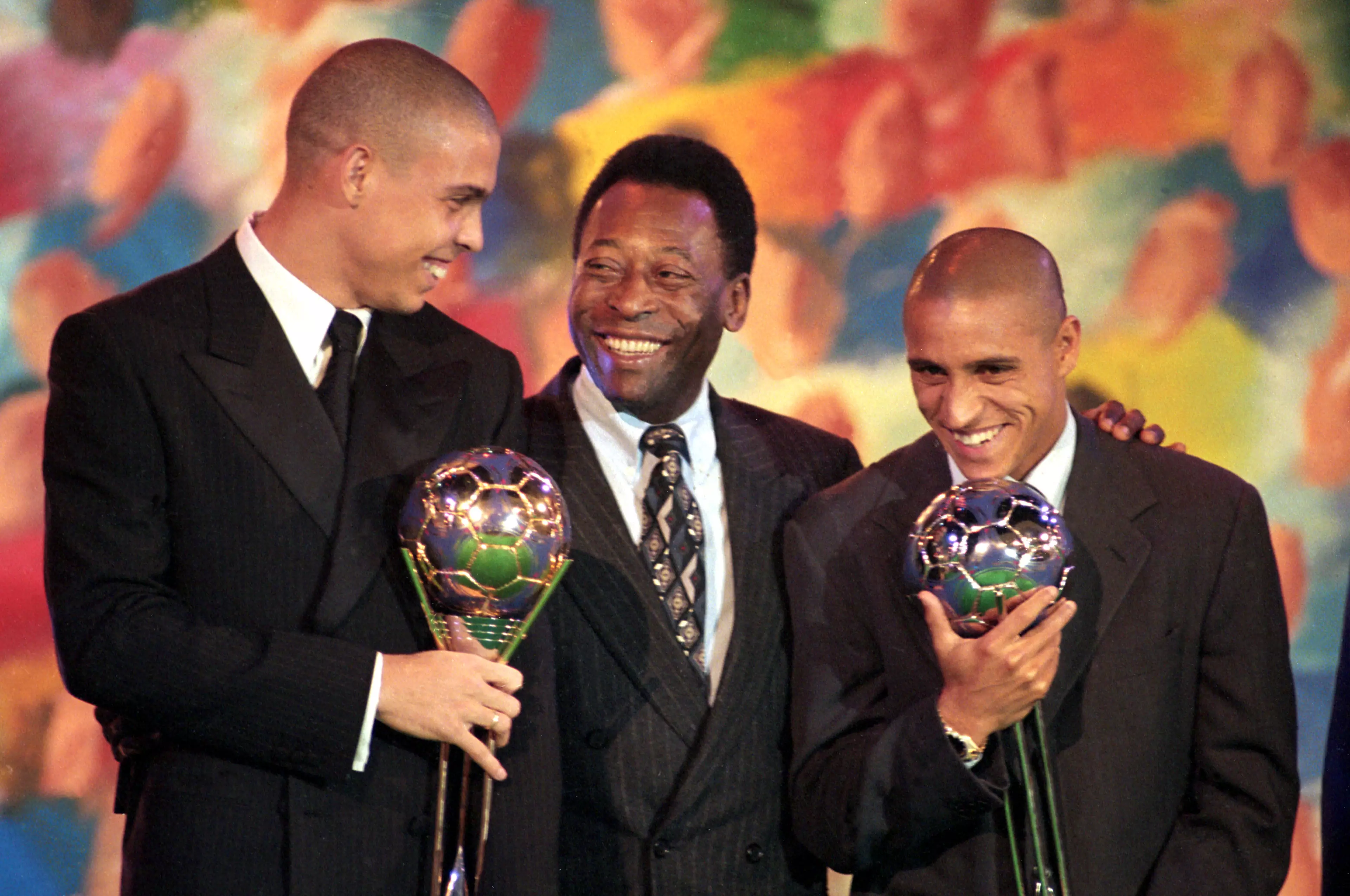 Ronaldo, along with Pele and runner up Roberto Carlos, with his 1997 award. Image: PA Images