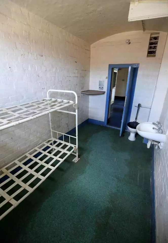Spend the night in a jail cell with a group of mates.