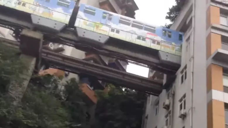 Train Goes Through Flats In China In Clever Design