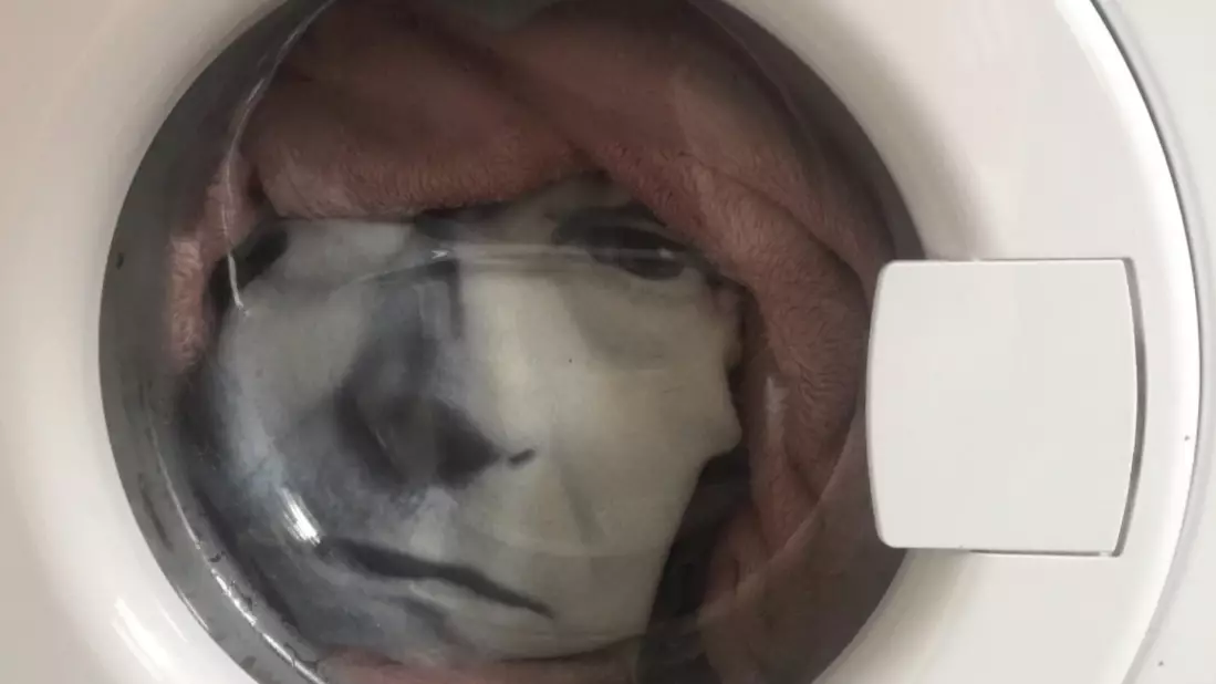Man Freaks Out After He Notices Face In Washing Machine Staring At Him
