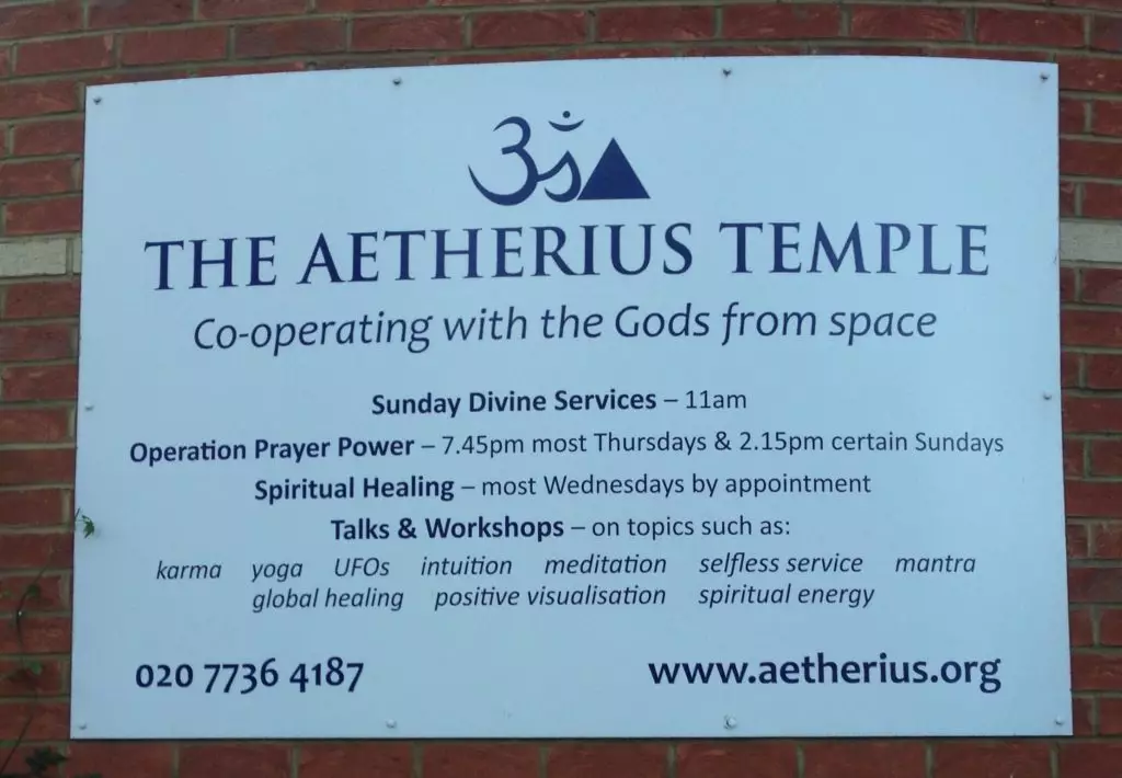 A sign outside the Aetherius Temple in Fulham advertising services.