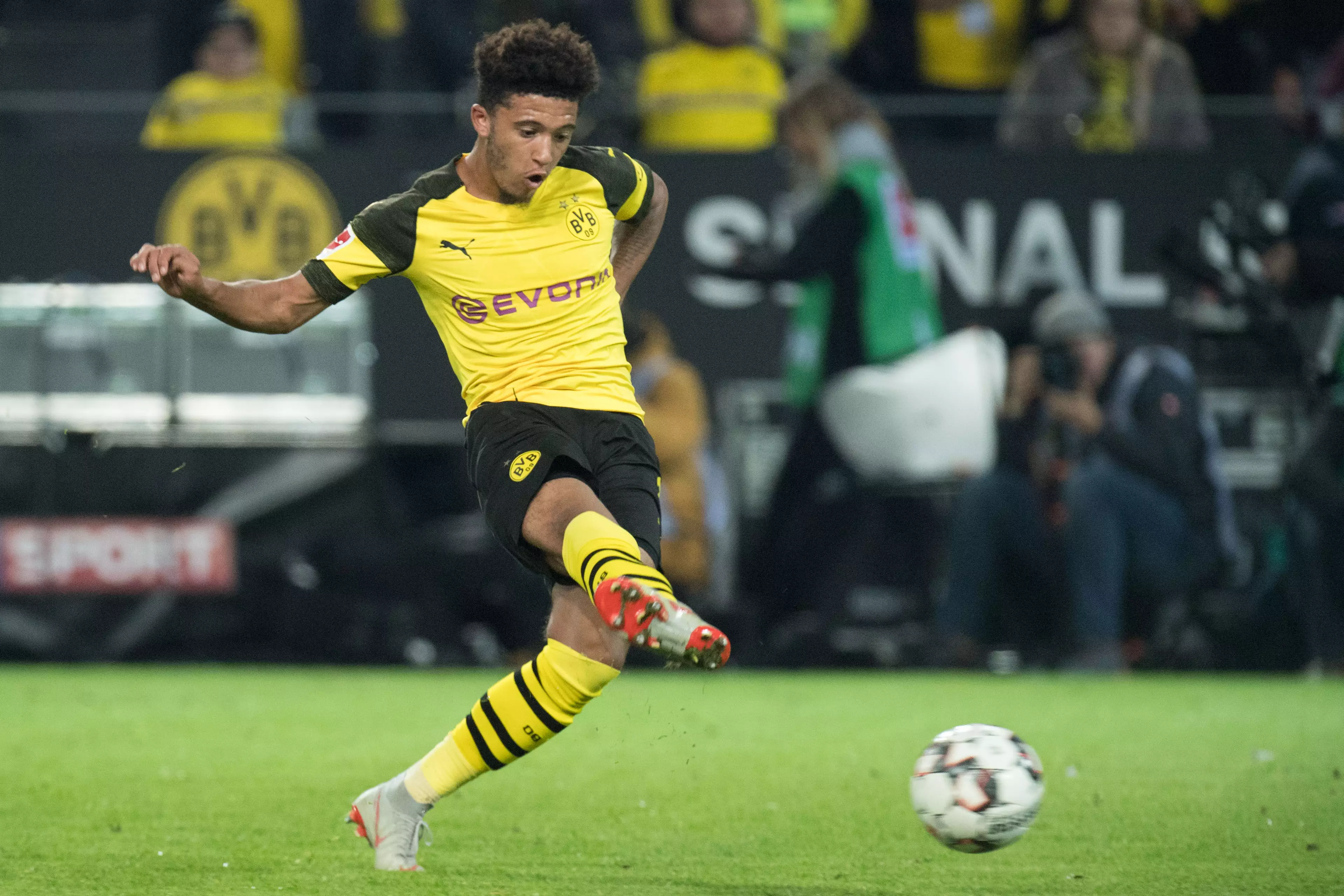 Sancho in action for Dortmund. Image: PA