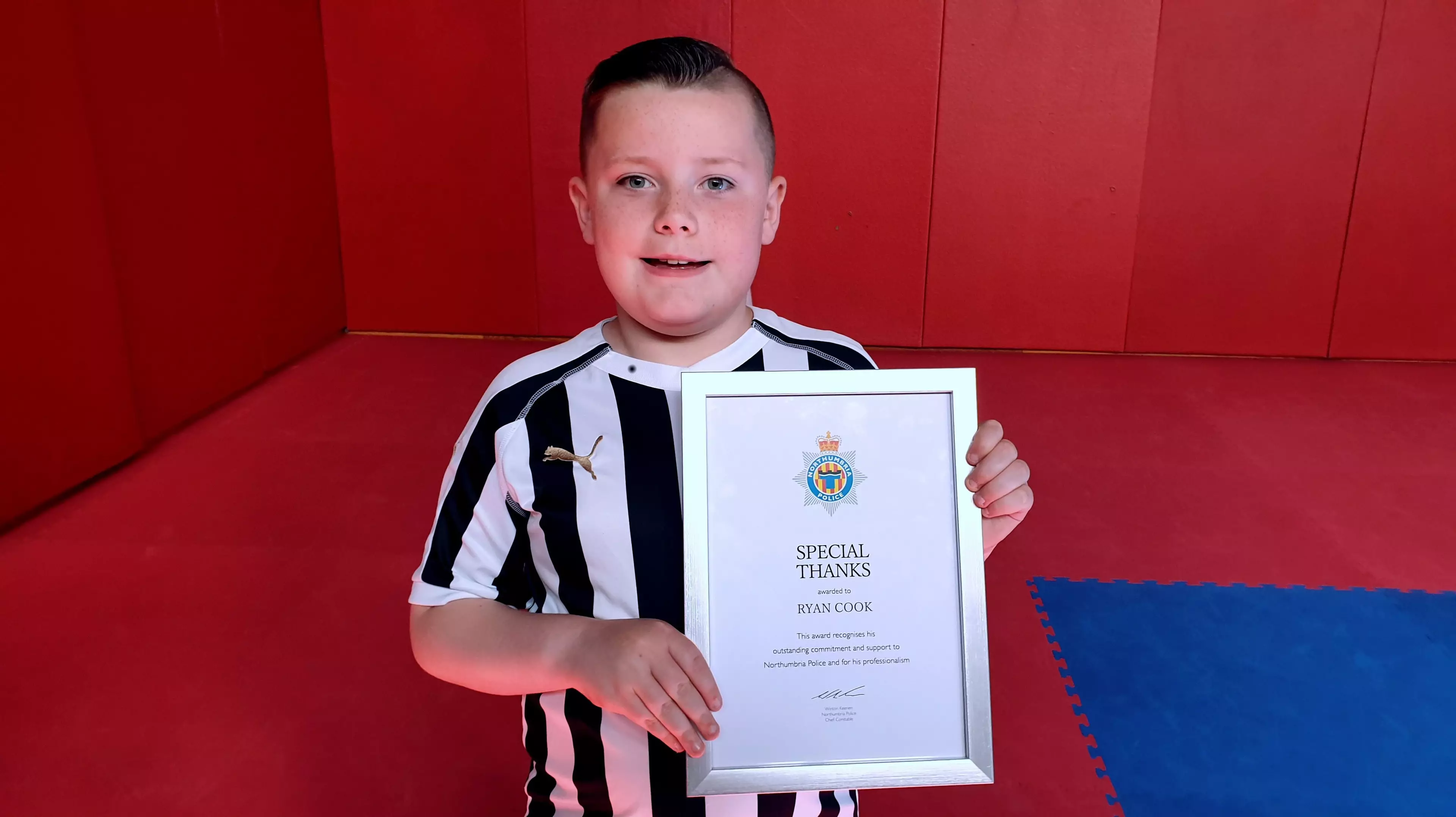 Ryan, with the certificate that he was presented with.