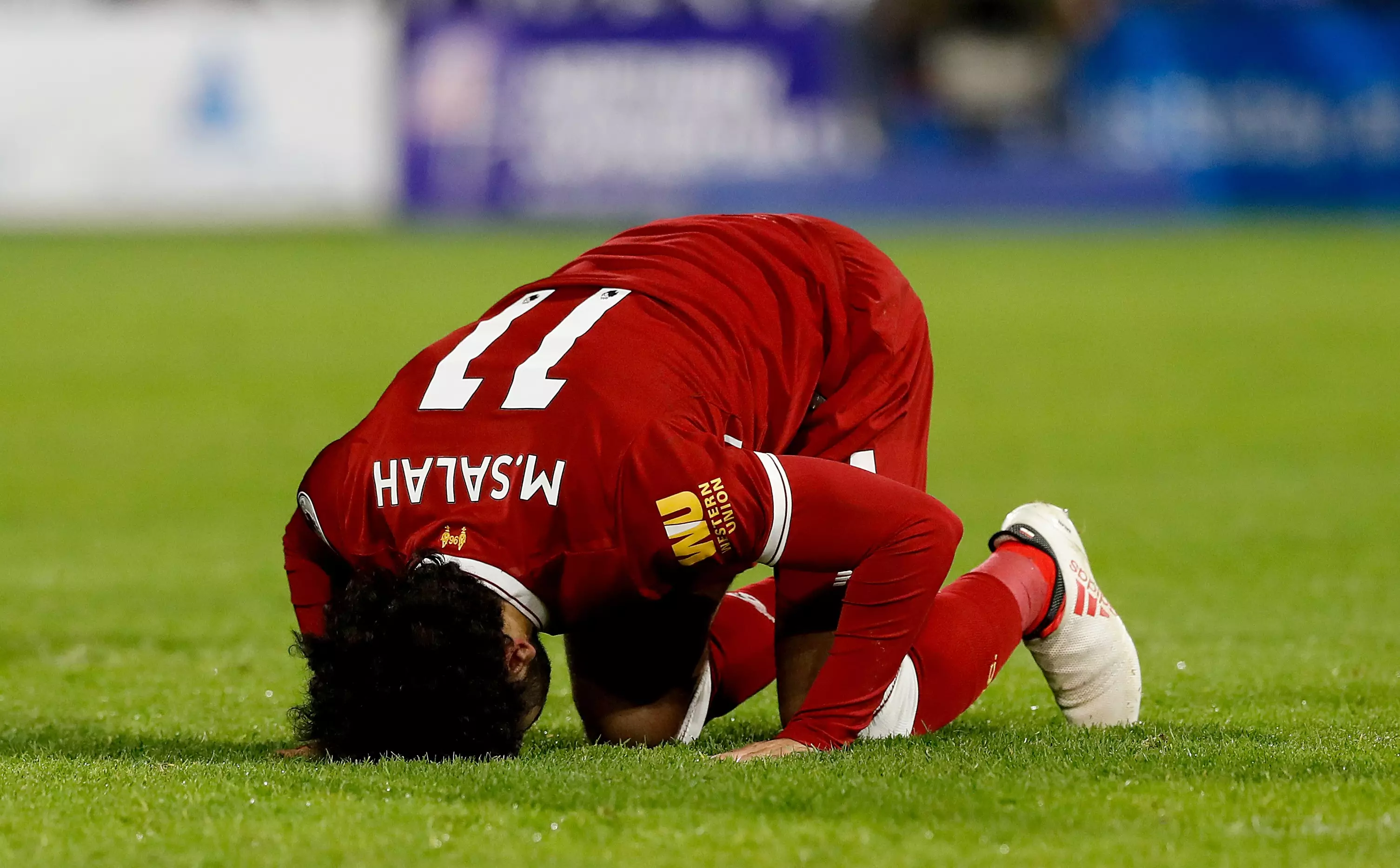 Salah celebrates scoring a goal for Liverpool. Image: PA