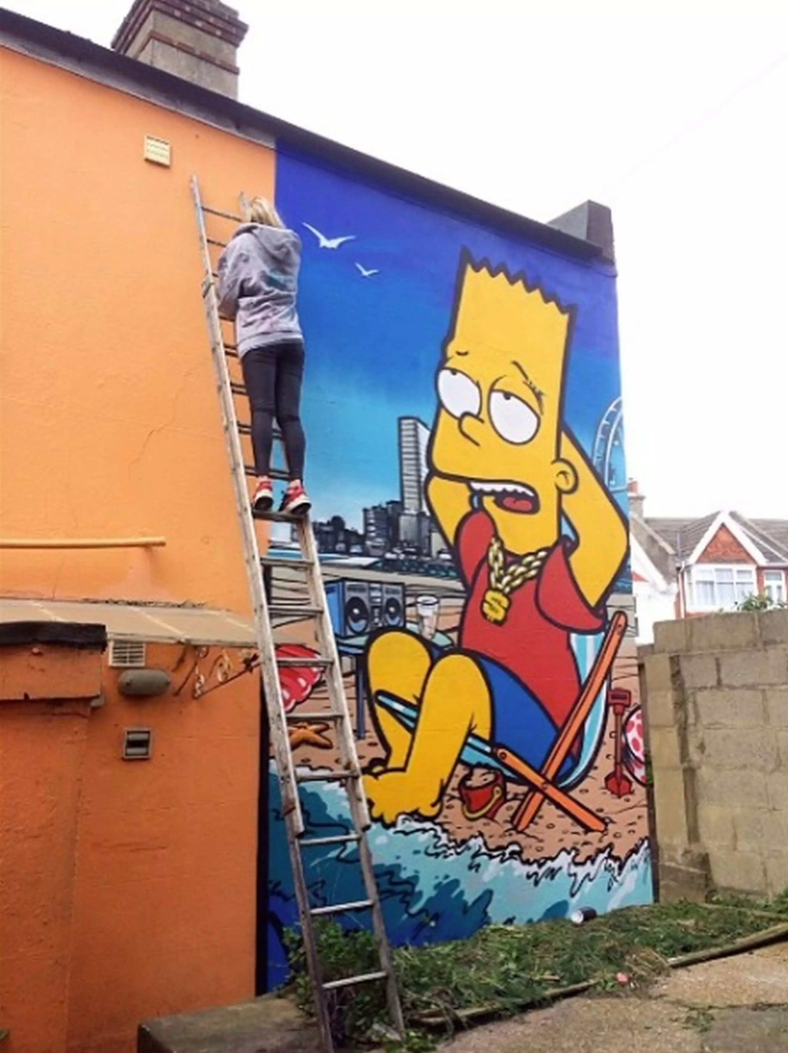 Charlie's new home has huge Simpsons' murals (