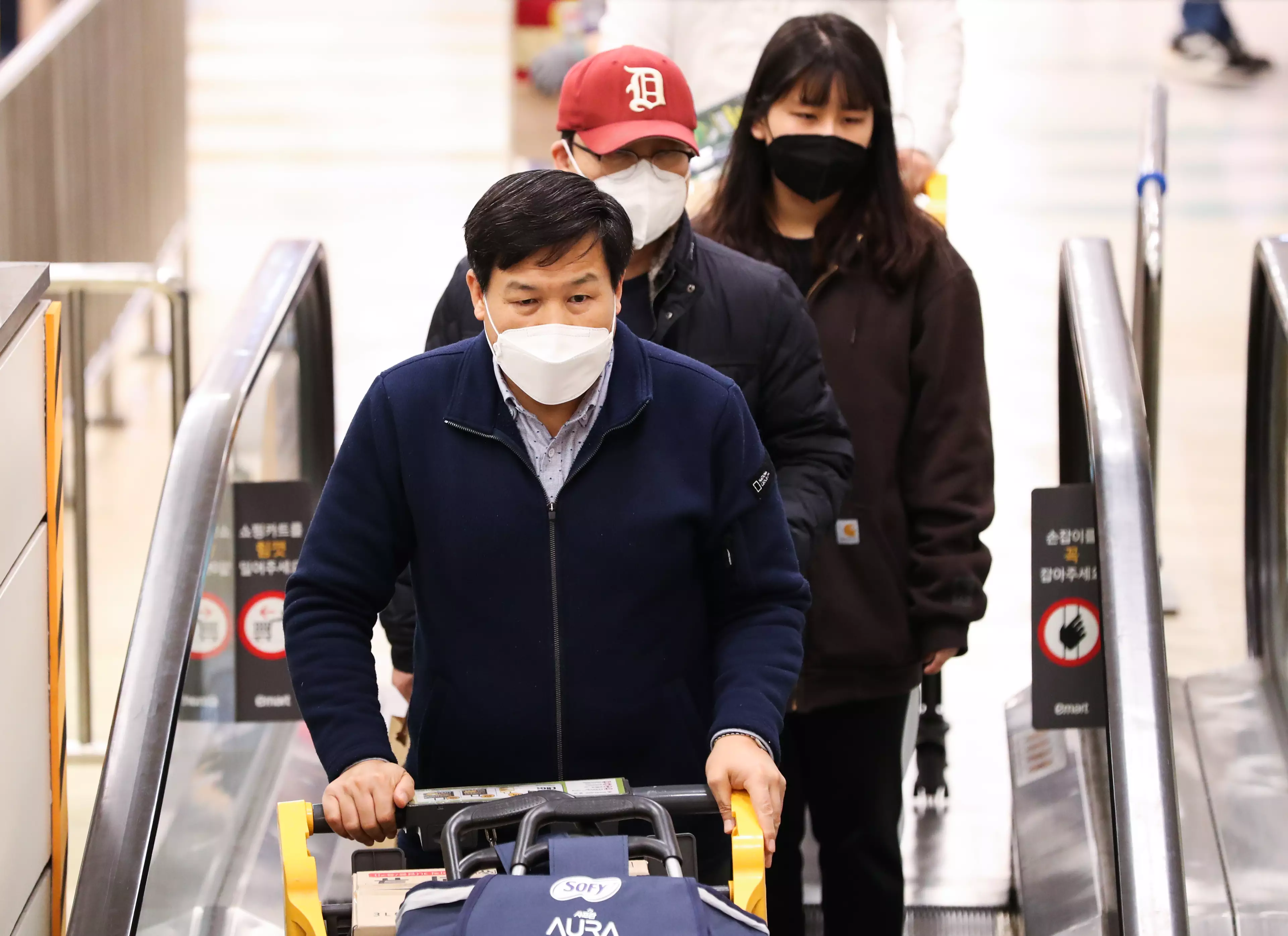 Shoppers wearing masks in Seoul, South Korea.