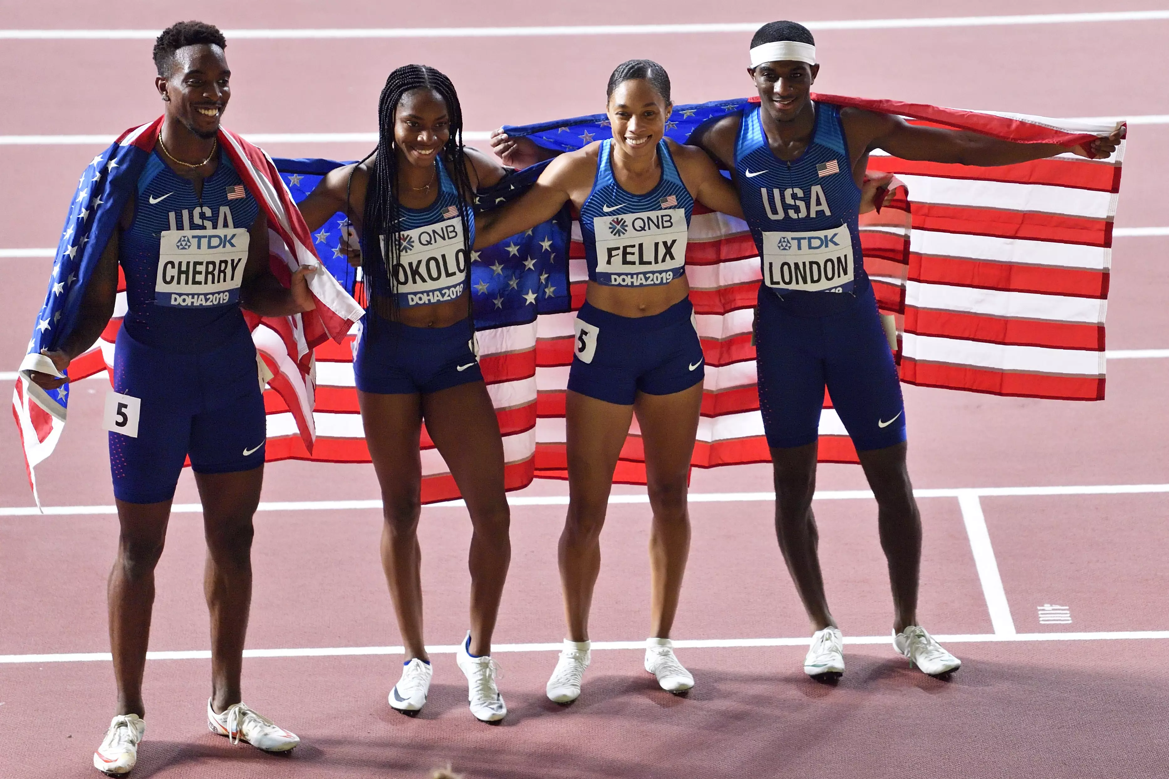 The USA team win gold in first ever mixed relay, giving Felix he 12th gold.